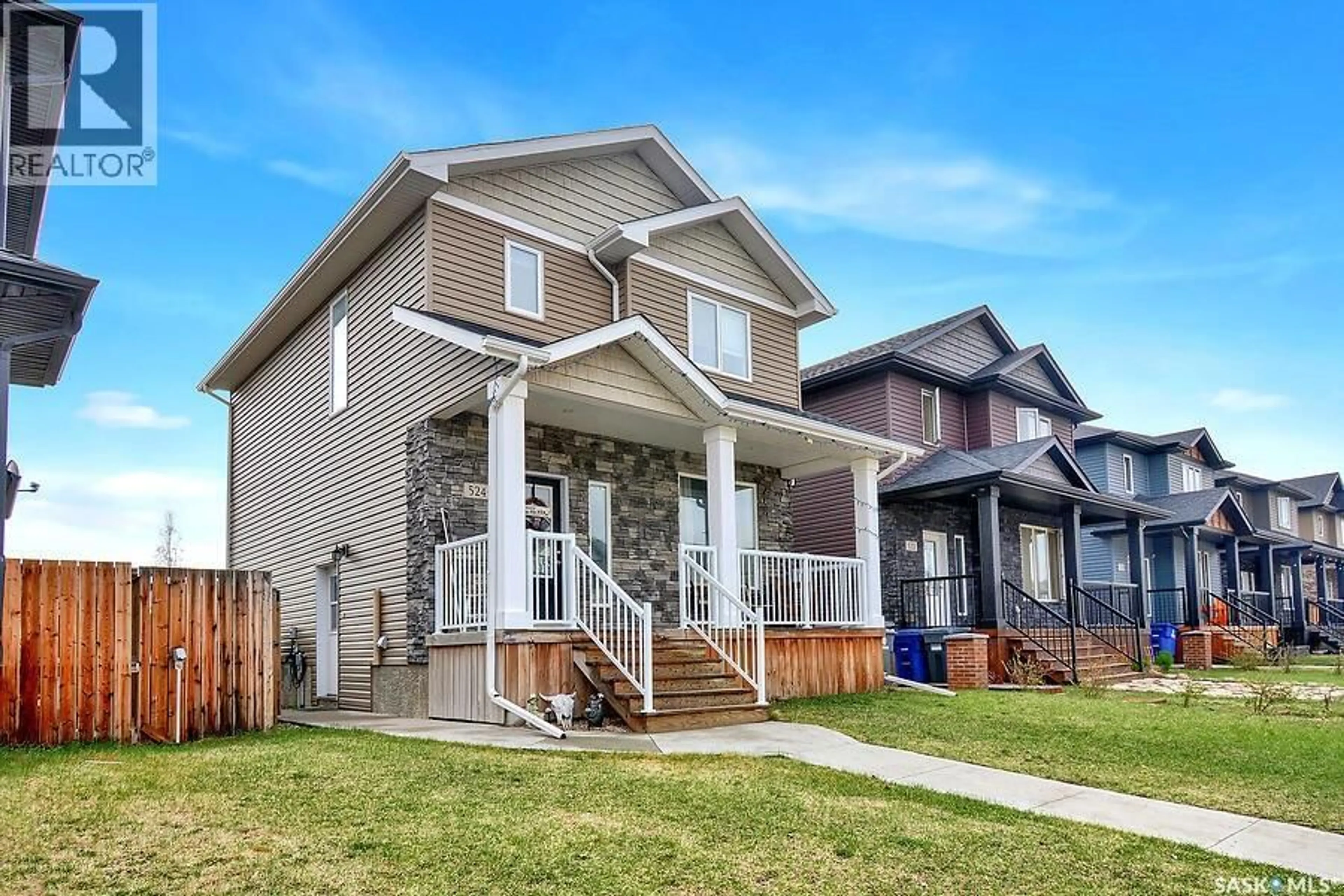 Home with vinyl exterior material, street for 524 MAPLE CRESCENT, Warman Saskatchewan S0K4S2
