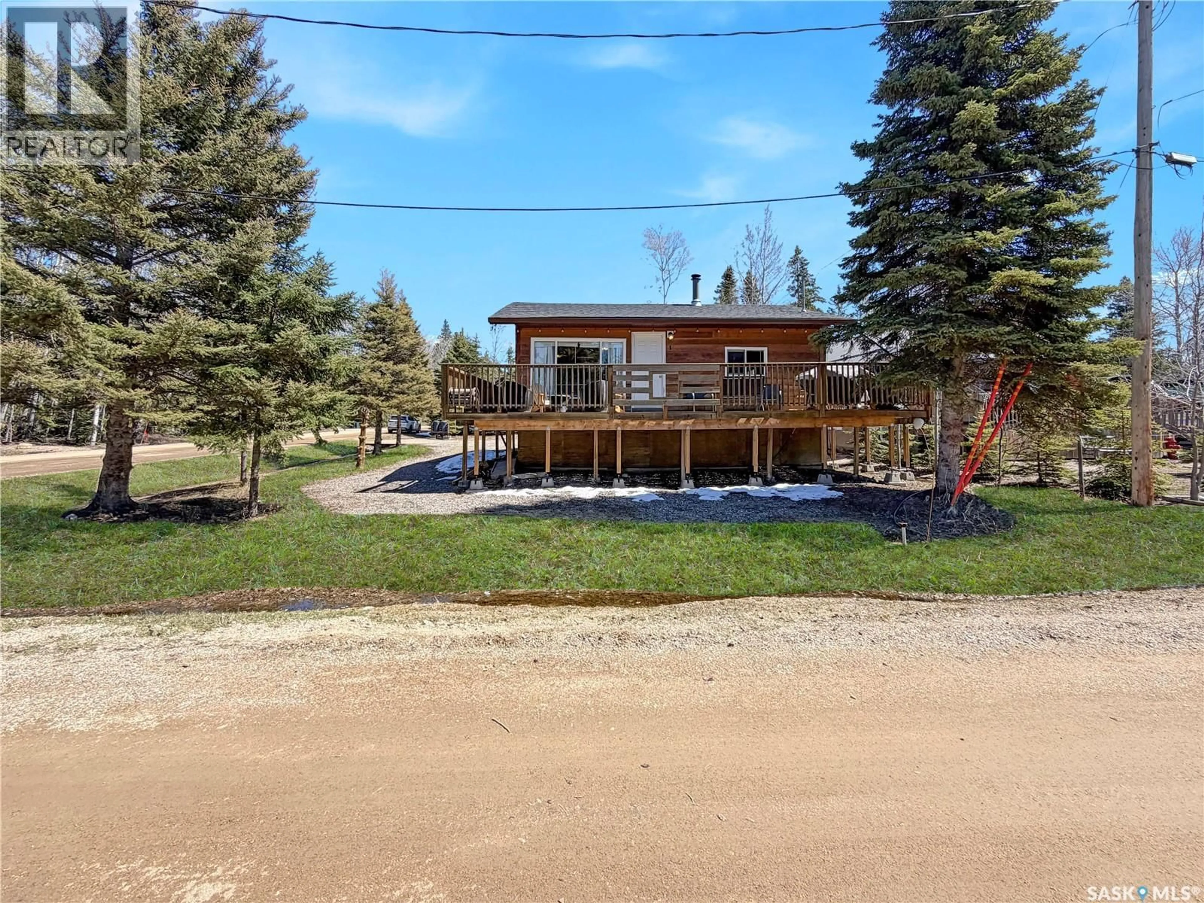 A pic from outside/outdoor area/front of a property/back of a property/a pic from drone, water/lake/river/ocean view for 1 HANSON PLACE, Candle Lake Saskatchewan S0J3E0