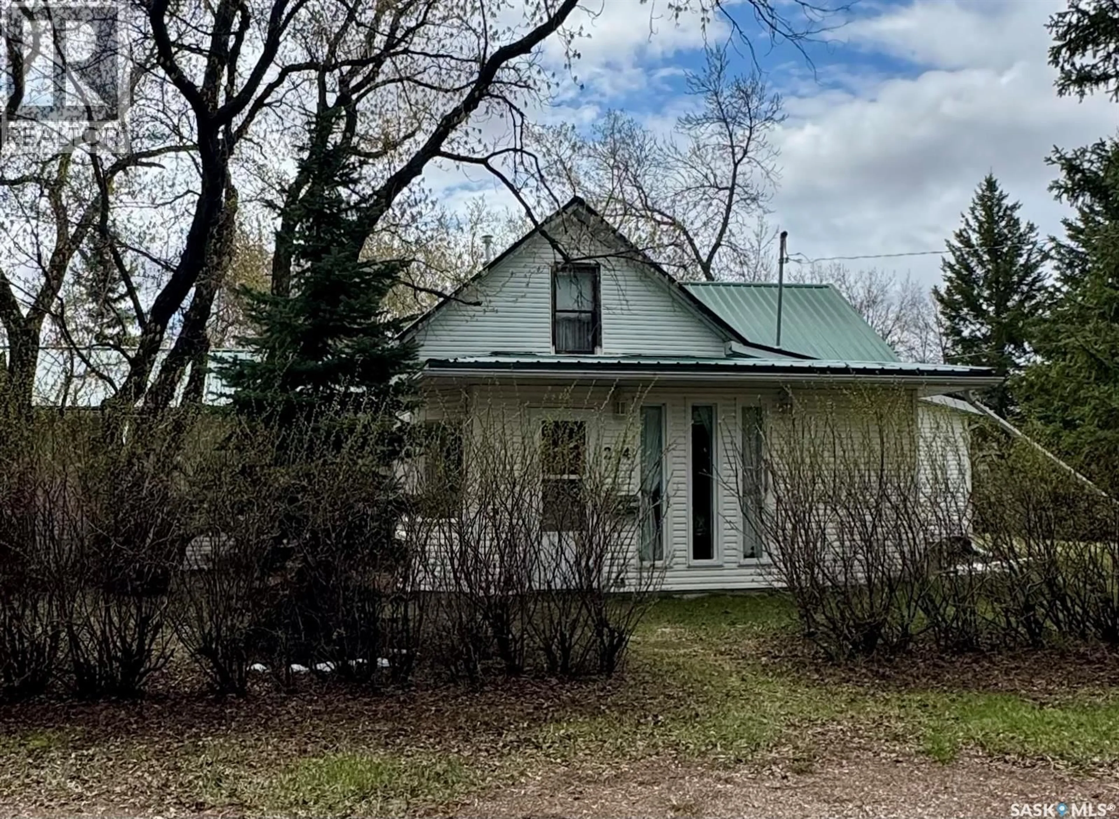A pic from outside/outdoor area/front of a property/back of a property/a pic from drone, unknown for 214 2ND STREET, Waldheim Saskatchewan S0K4R0