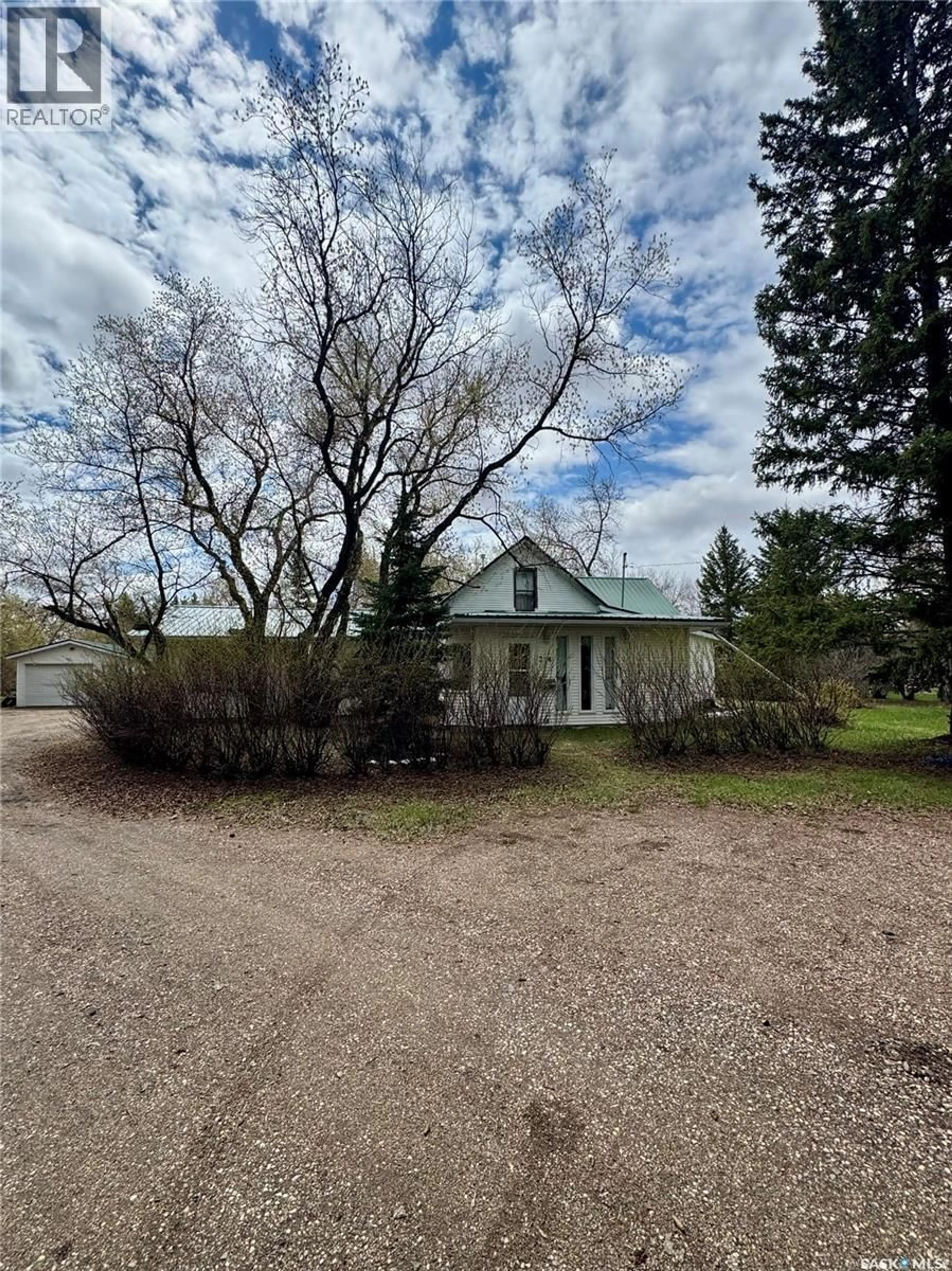 A pic from outside/outdoor area/front of a property/back of a property/a pic from drone, street for 214 2ND STREET, Waldheim Saskatchewan S0K4R0