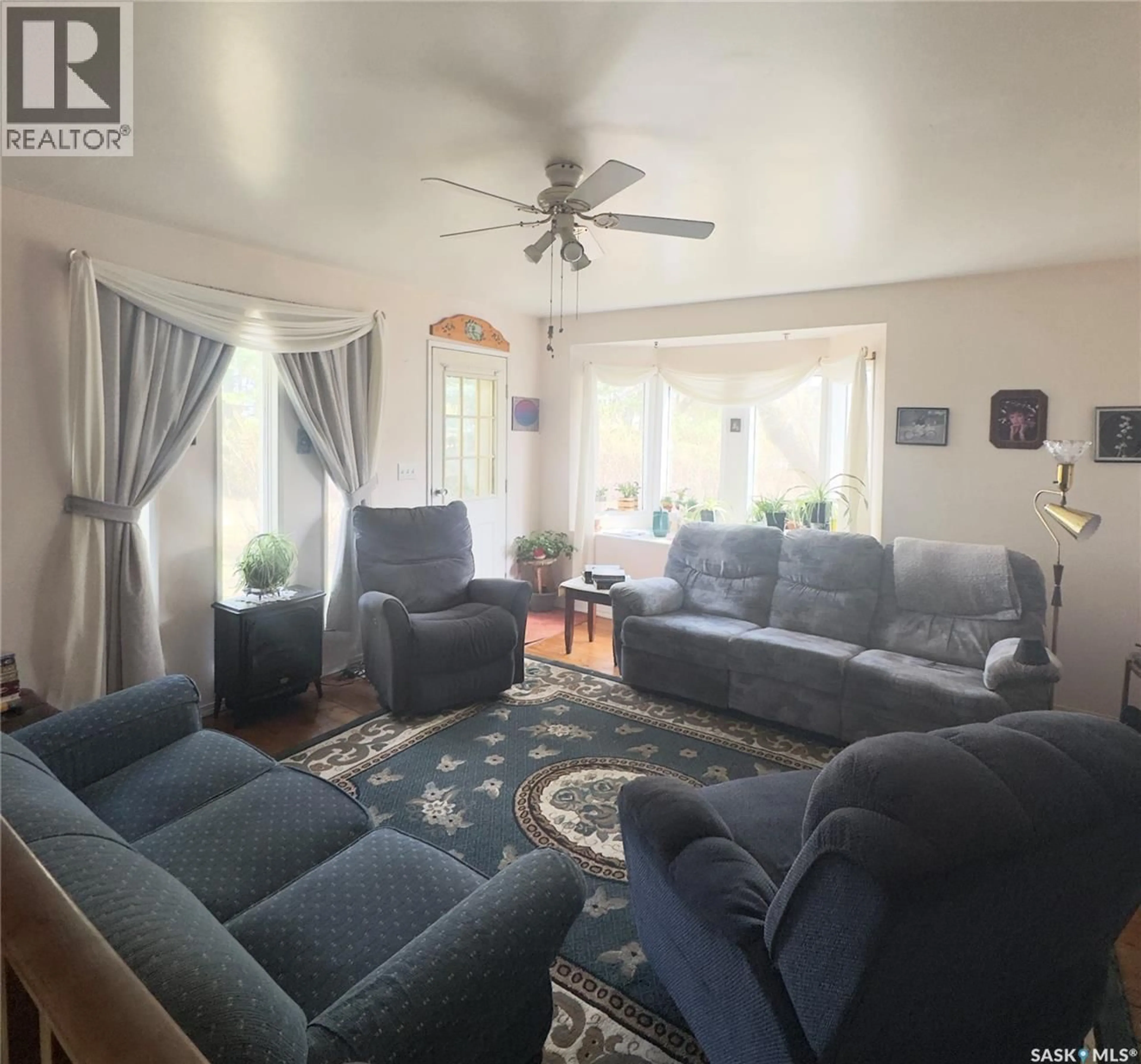 Living room with furniture, unknown for 214 2ND STREET, Waldheim Saskatchewan S0K4R0