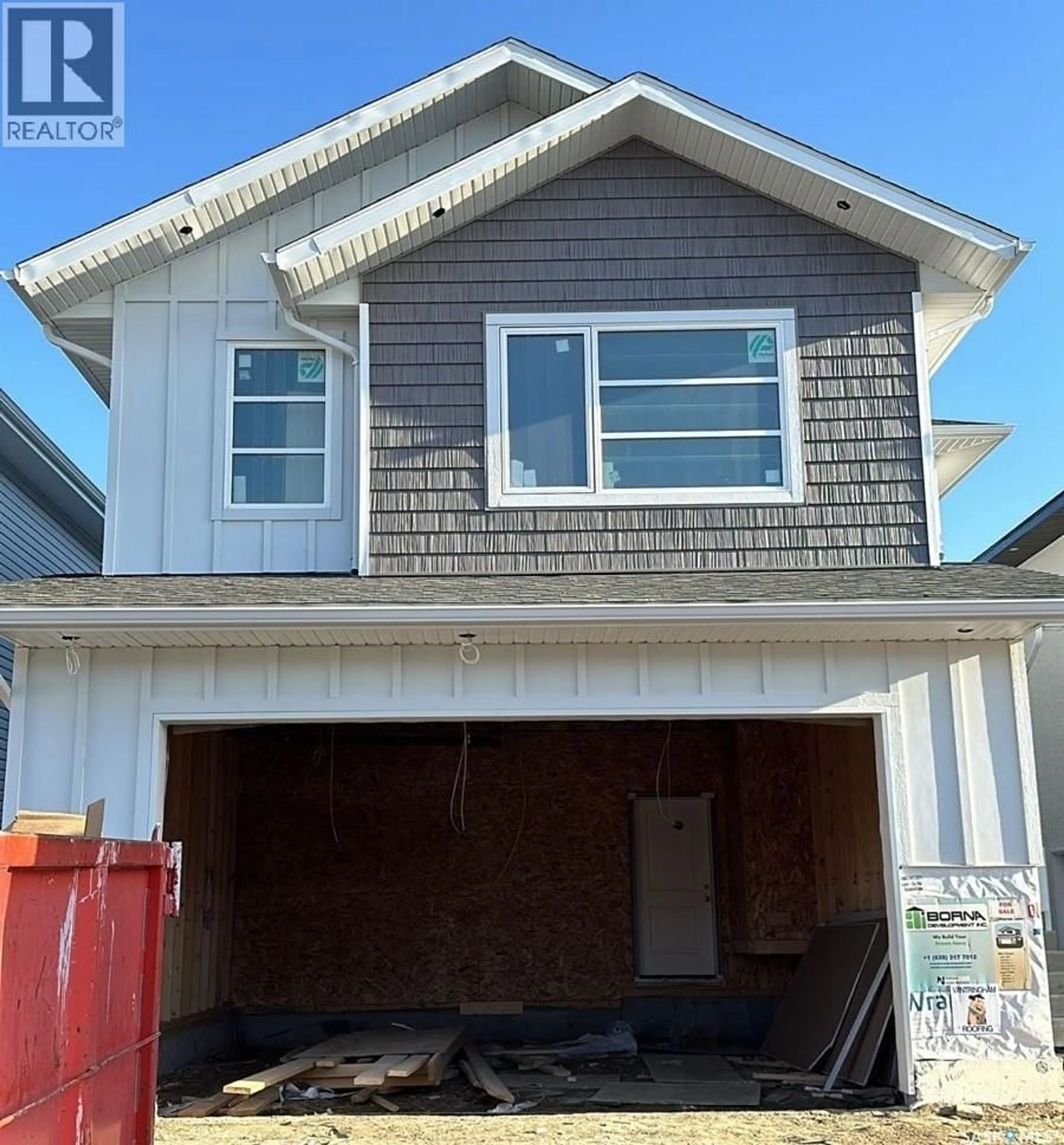 Home with vinyl exterior material, street for 138 SHARMA LANE, Saskatoon Saskatchewan S7W1L1