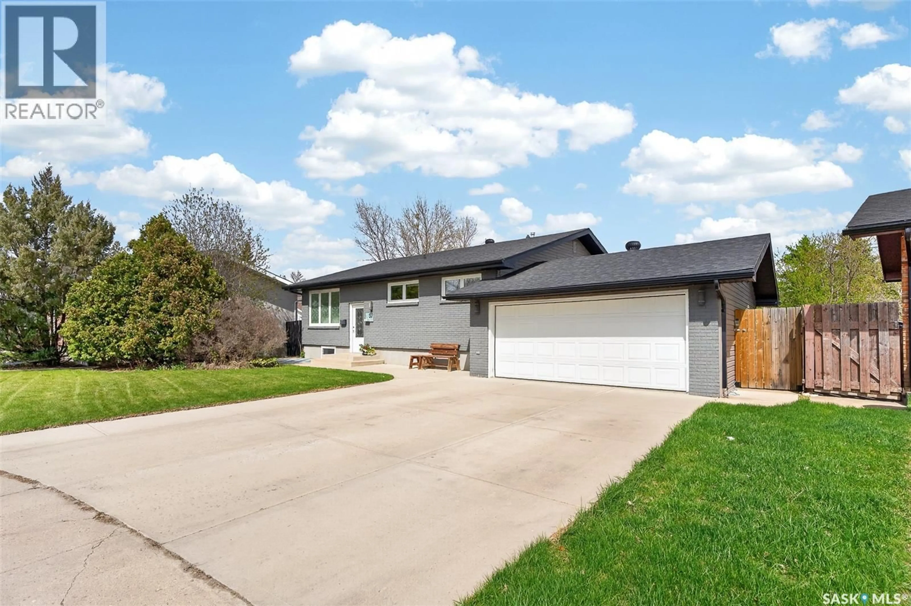 Home with vinyl exterior material, street for 57 DAISY CRESCENT, Moose Jaw Saskatchewan S6J1C2