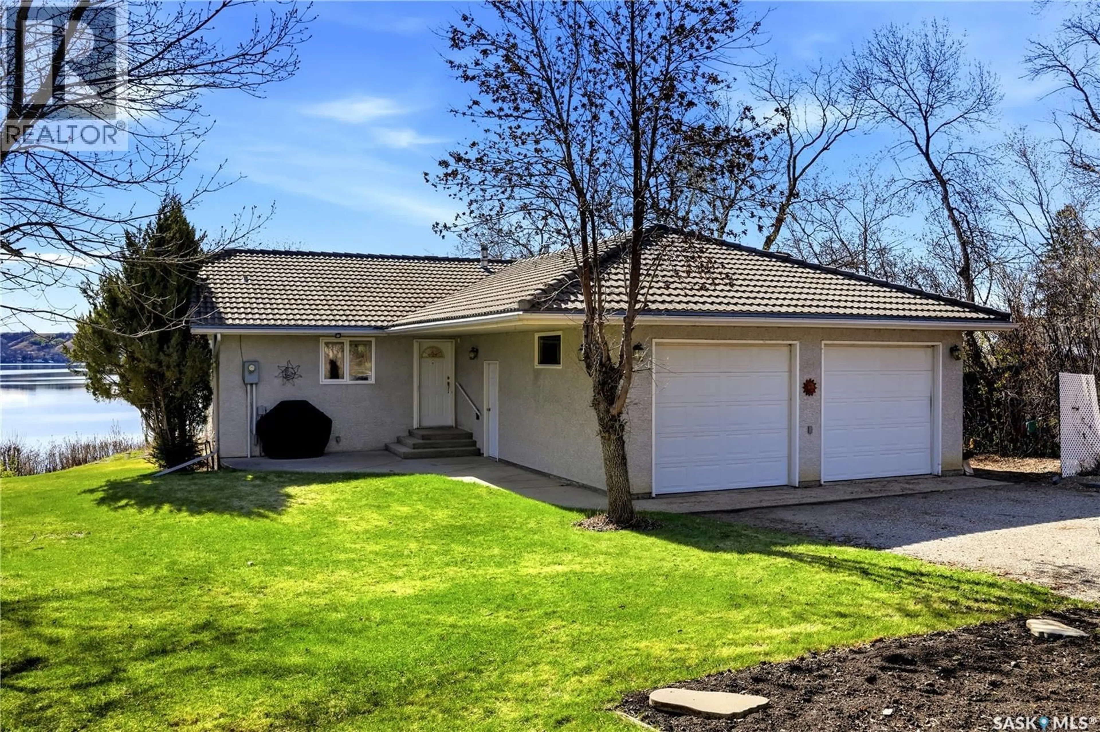 Home with vinyl exterior material, street for 136B S KATEPWA DRIVE, Katepwa Beach Saskatchewan S0G1S0