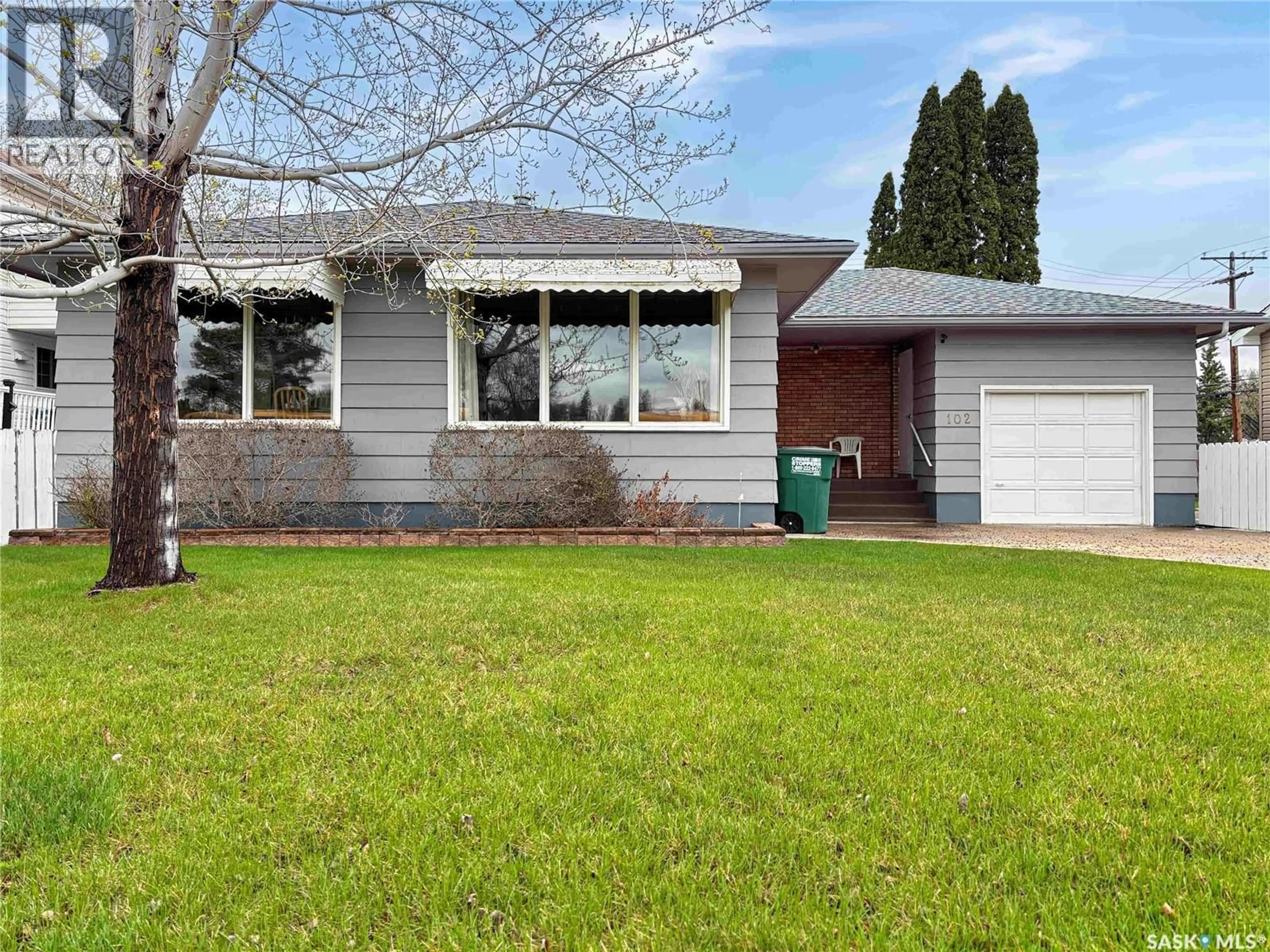 Home with vinyl exterior material, street for 102 105TH STREET, Saskatoon Saskatchewan S7N1N1