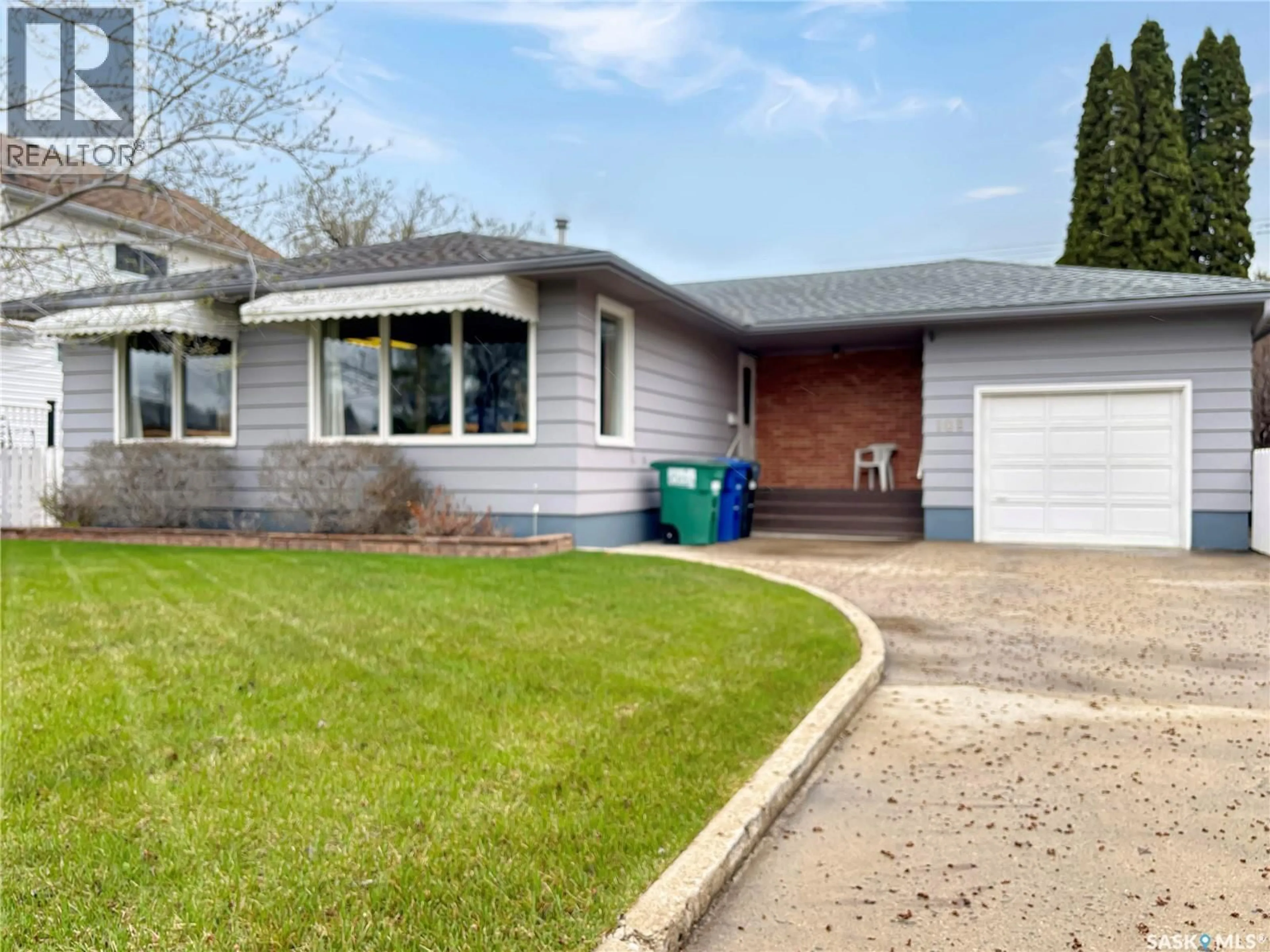 Home with vinyl exterior material, street for 102 105TH STREET, Saskatoon Saskatchewan S7N1N1
