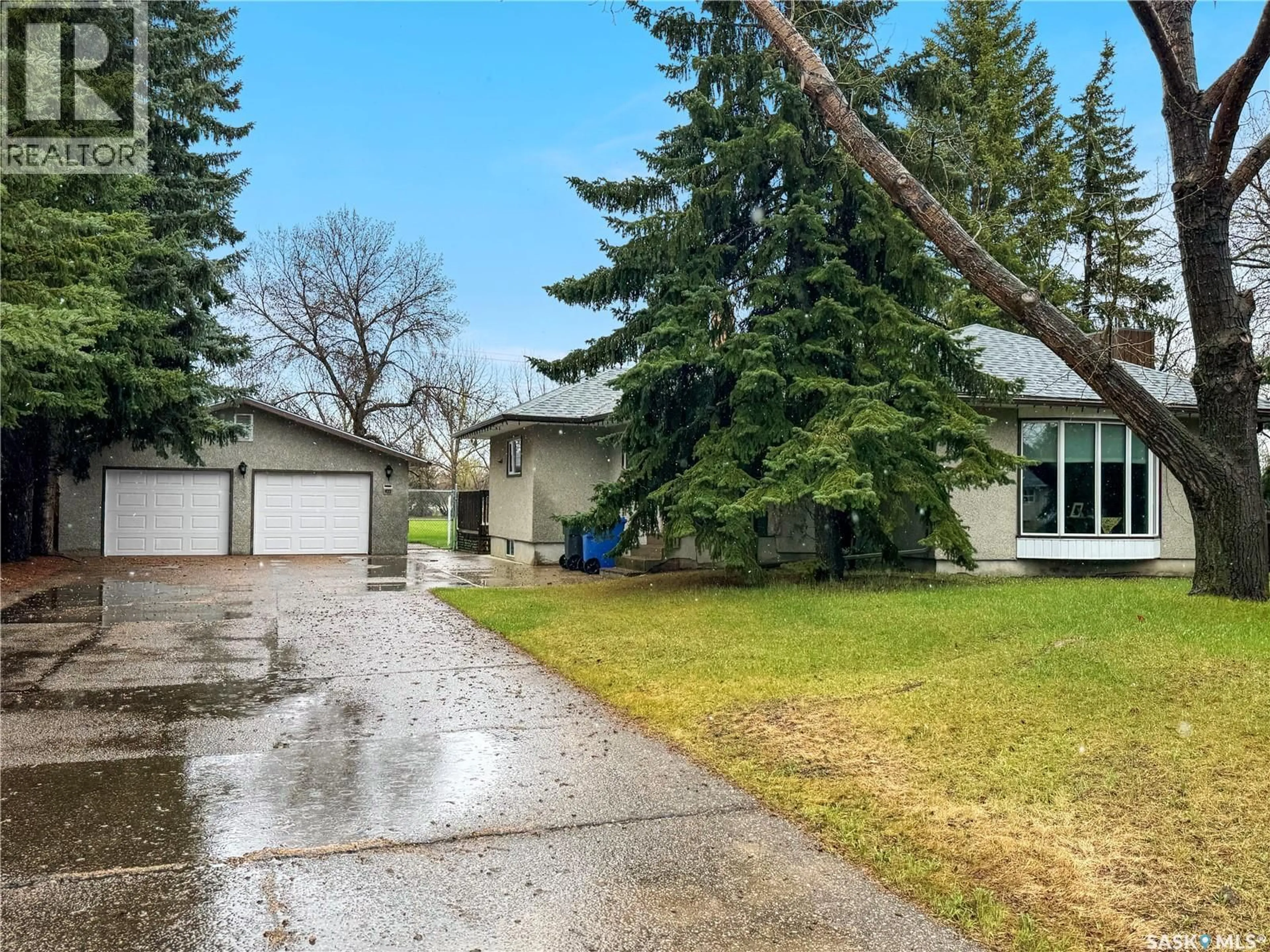 A pic from outside/outdoor area/front of a property/back of a property/a pic from drone, street for 932 113TH STREET, North Battleford Saskatchewan S9A2M1