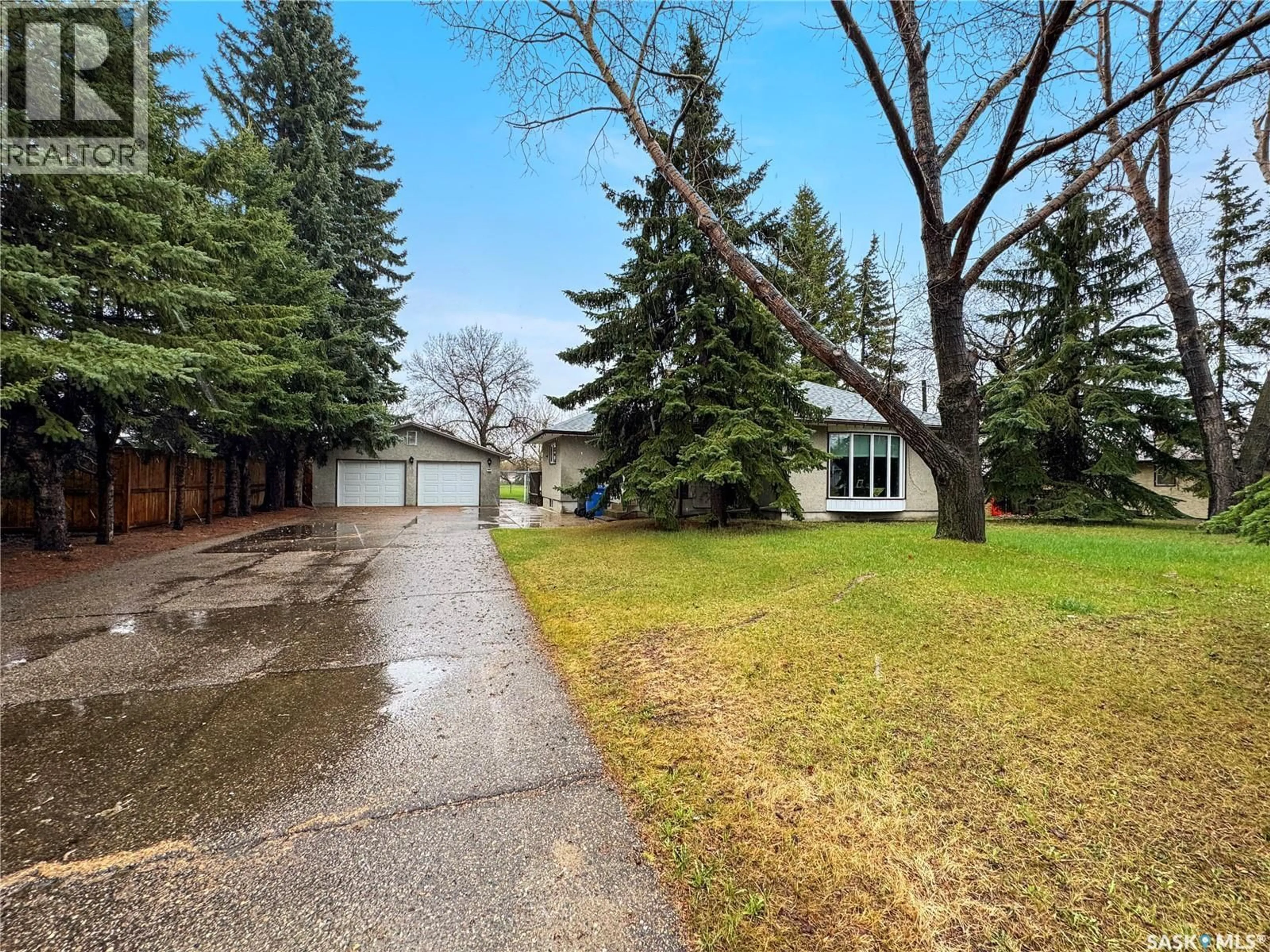 A pic from outside/outdoor area/front of a property/back of a property/a pic from drone, street for 932 113TH STREET, North Battleford Saskatchewan S9A2M1