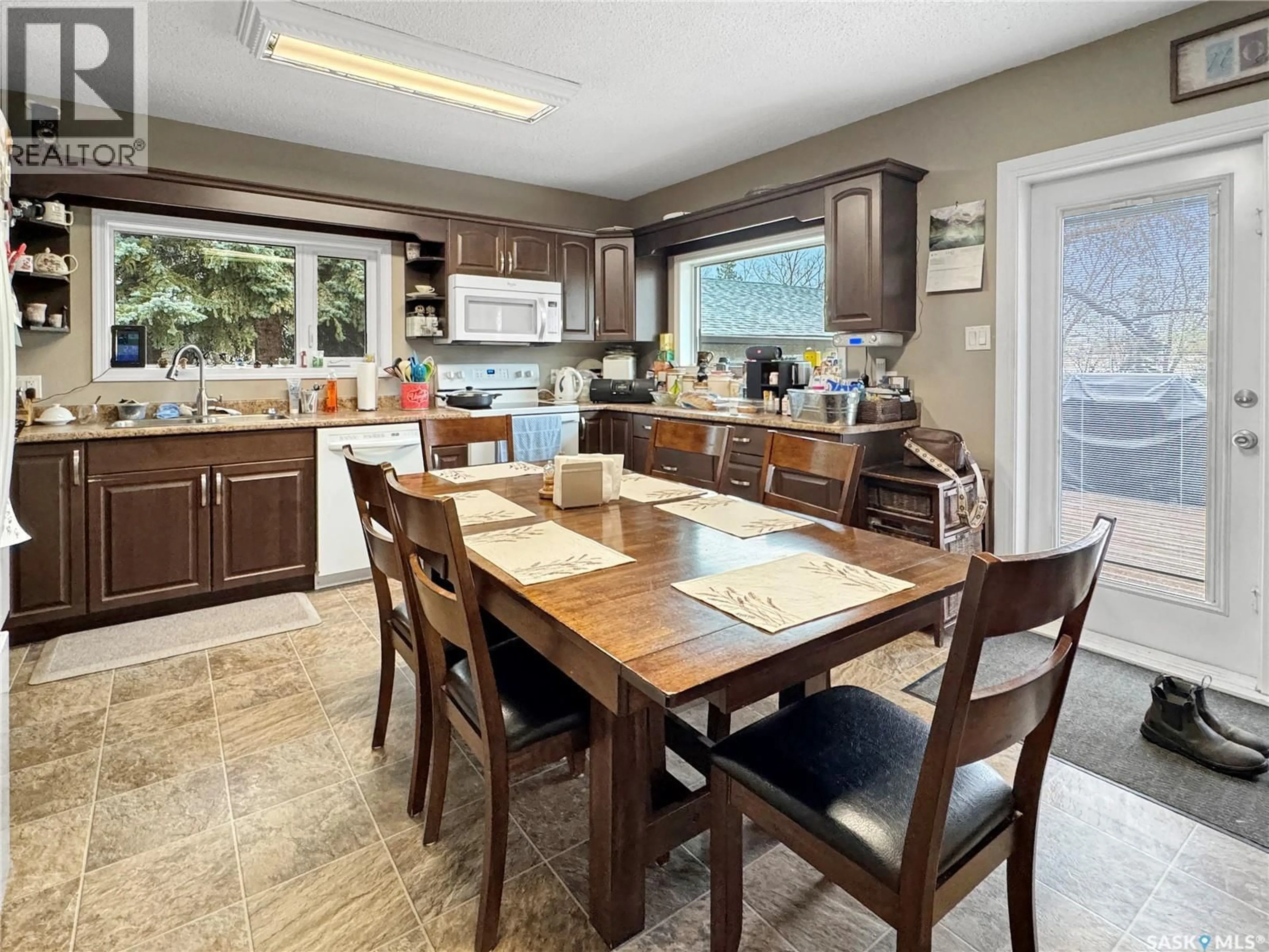 Open concept kitchen, ceramic/tile floor for 932 113TH STREET, North Battleford Saskatchewan S9A2M1