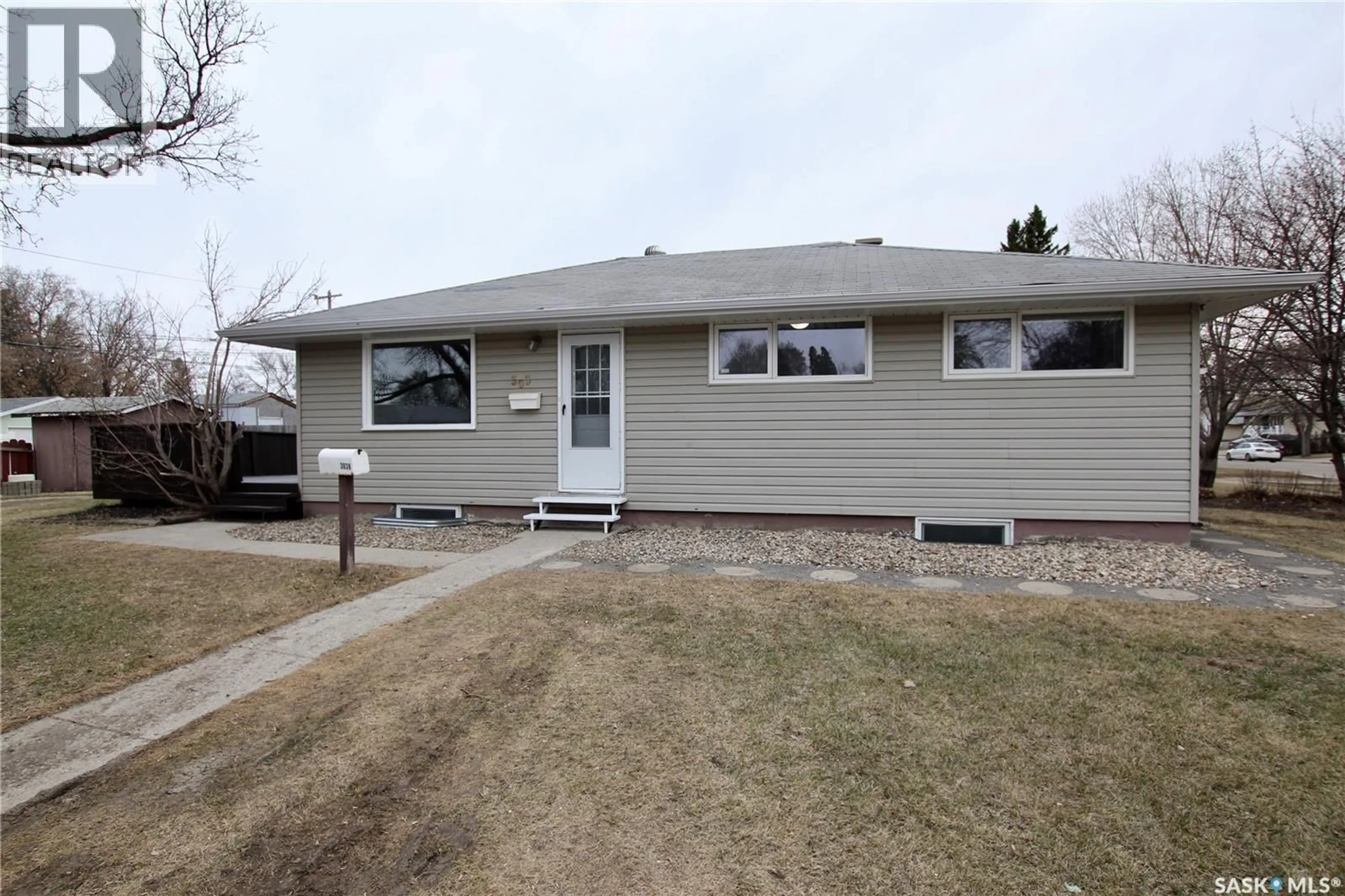 Home with vinyl exterior material, street for 303 ROYAL STREET, Regina Saskatchewan S4R4Y2