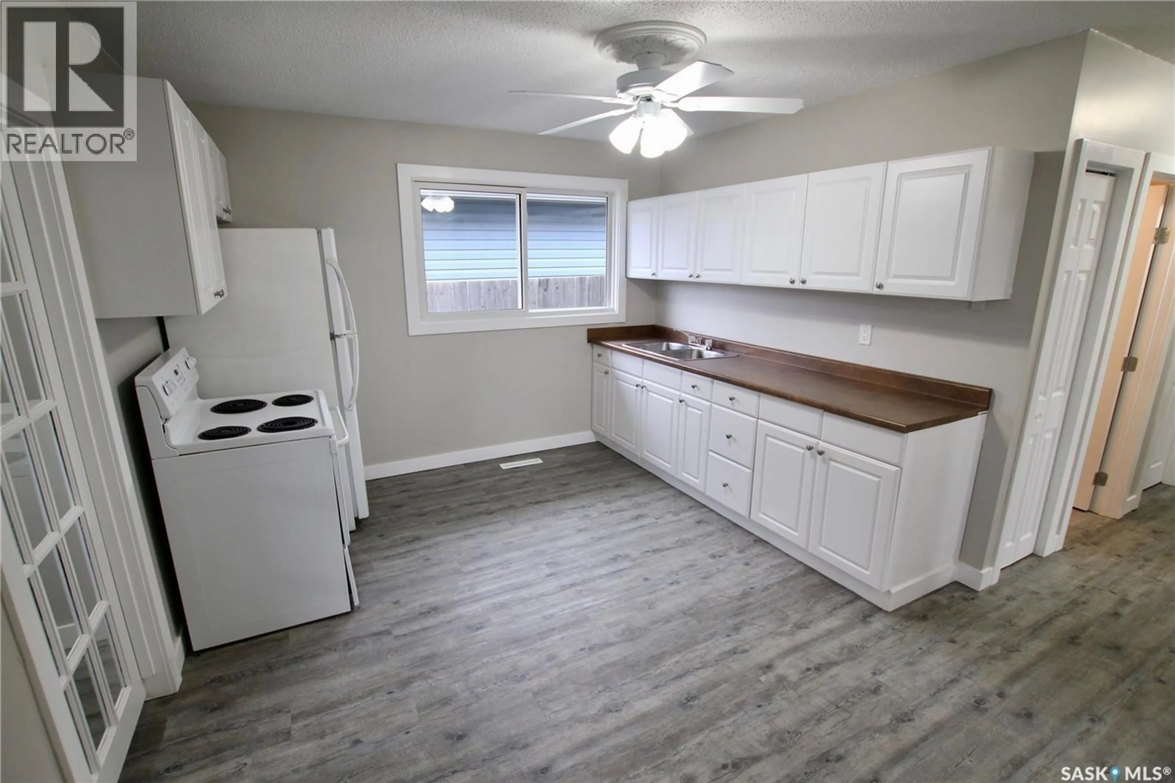 Standard kitchen, wood/laminate floor for 303 ROYAL STREET, Regina Saskatchewan S4R4Y2