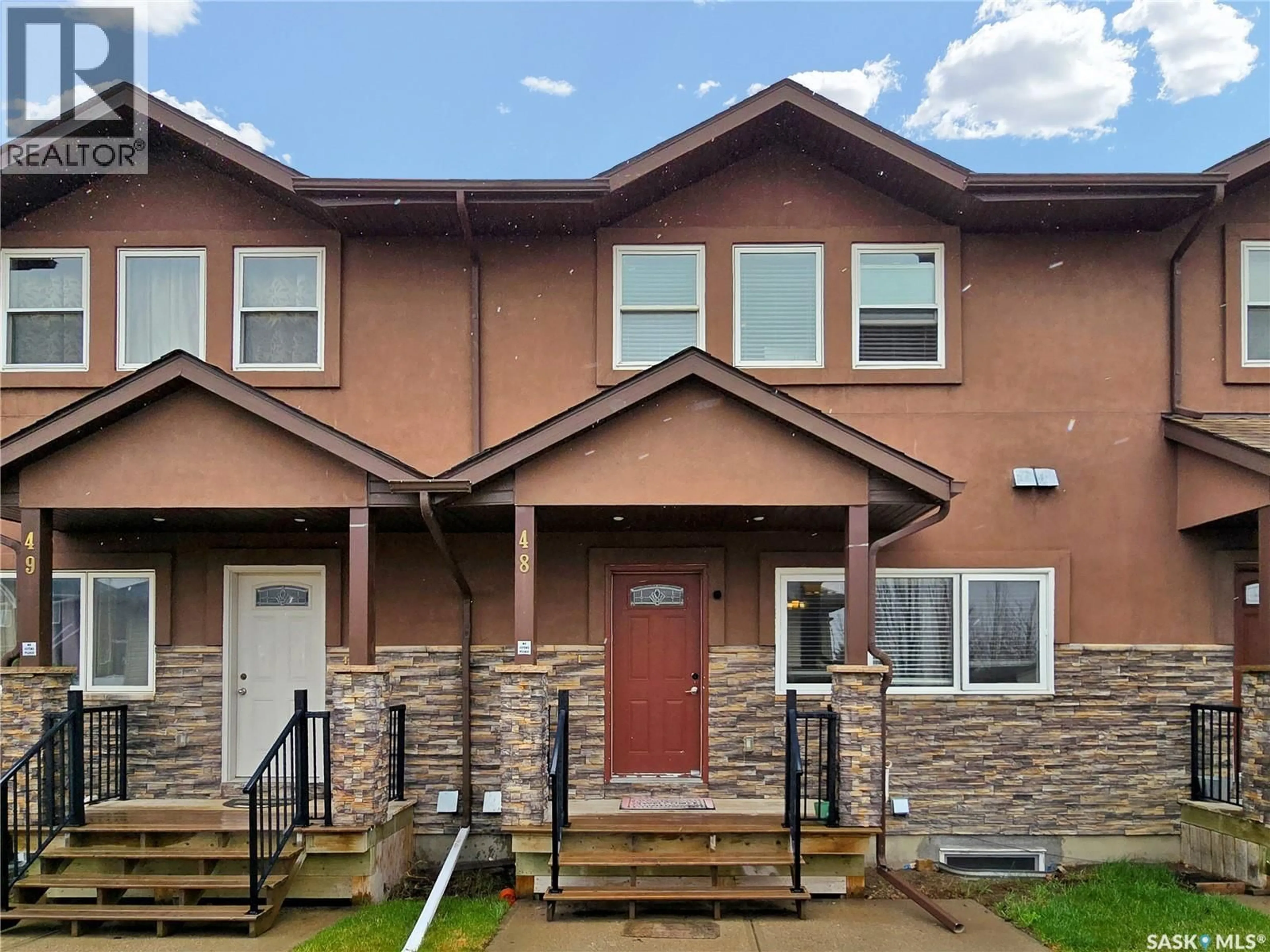 Home with brick exterior material, street for 48 - 1703 PATRICK CRESCENT, Saskatoon Saskatchewan S7W0L6