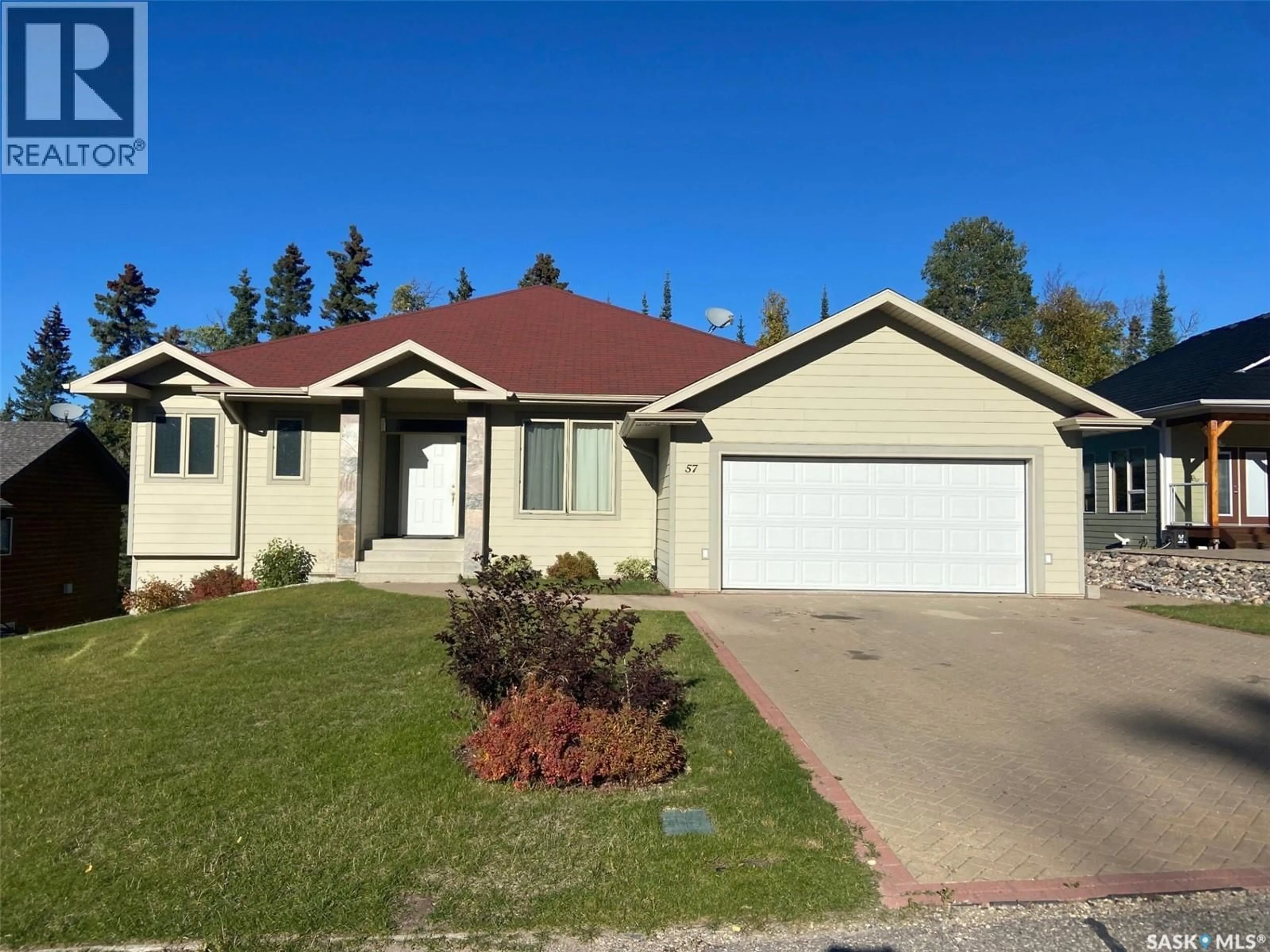 Home with vinyl exterior material, street for 57 ESTATES DRIVE, Elk Ridge Saskatchewan S0J0N0