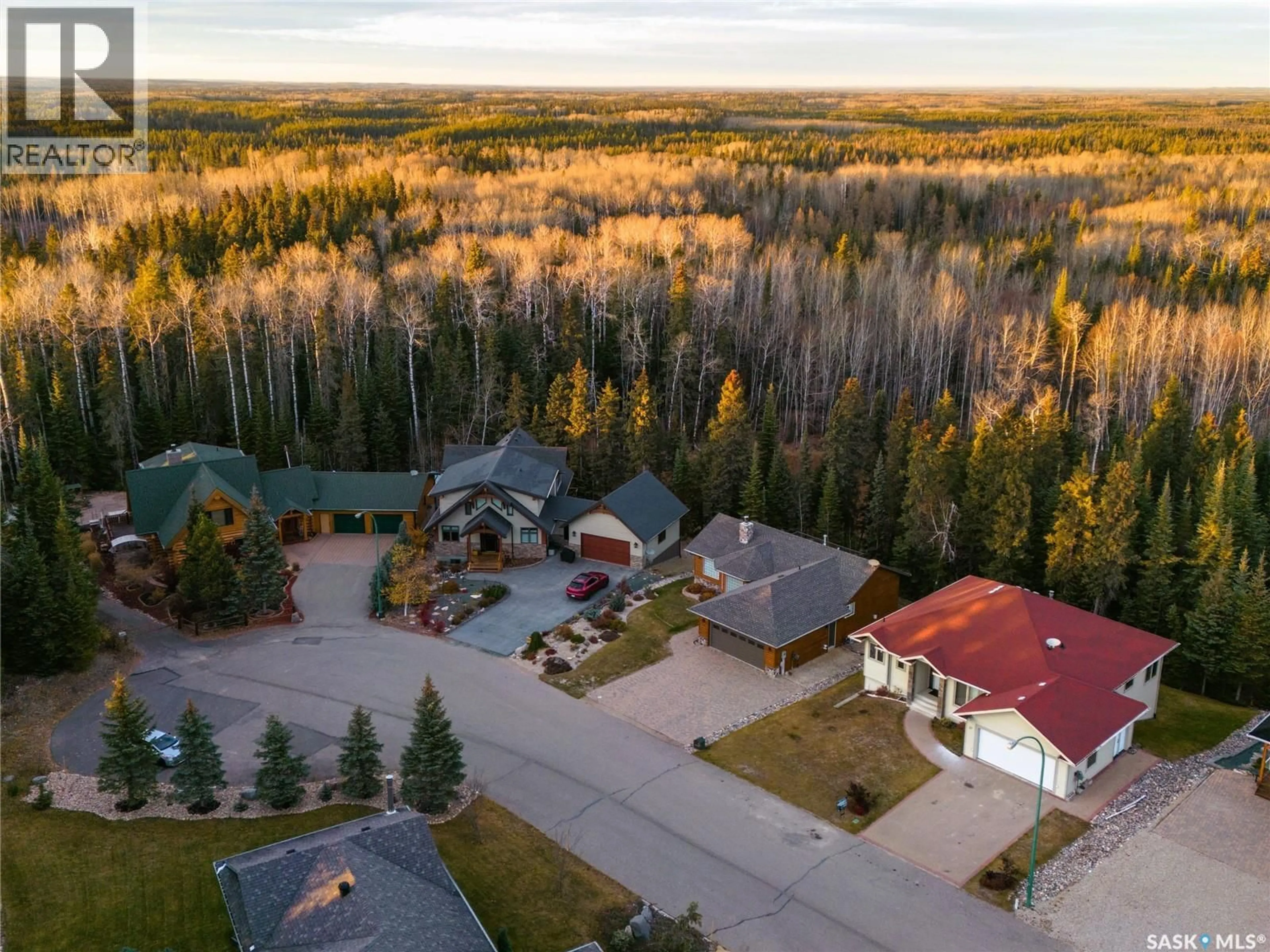 A pic from outside/outdoor area/front of a property/back of a property/a pic from drone, forest/trees view for 57 ESTATES DRIVE, Elk Ridge Saskatchewan S0J0N0