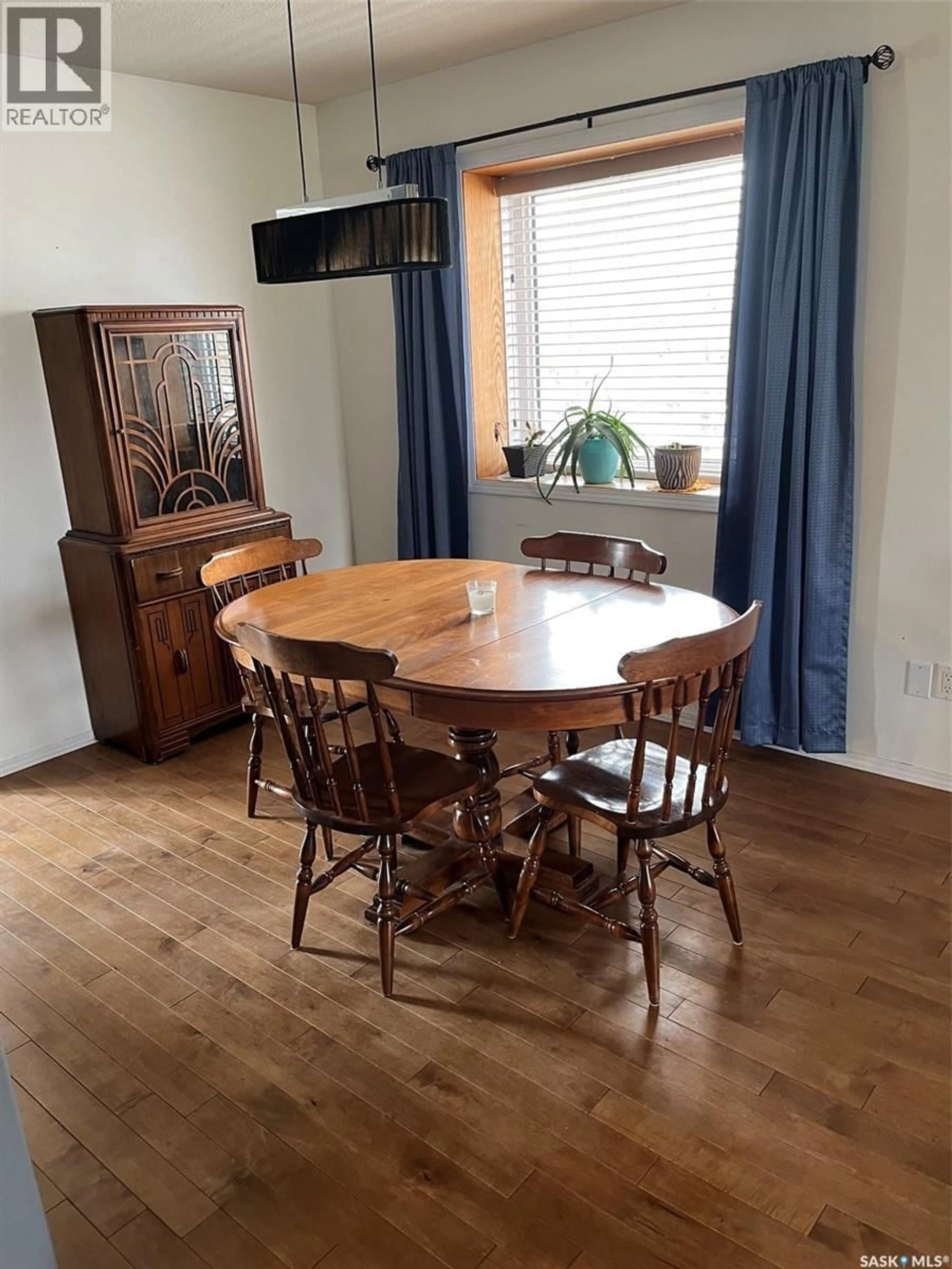 Dining room, wood/laminate floor for 404 PETTERSON DRIVE, Estevan Saskatchewan S4A2P4