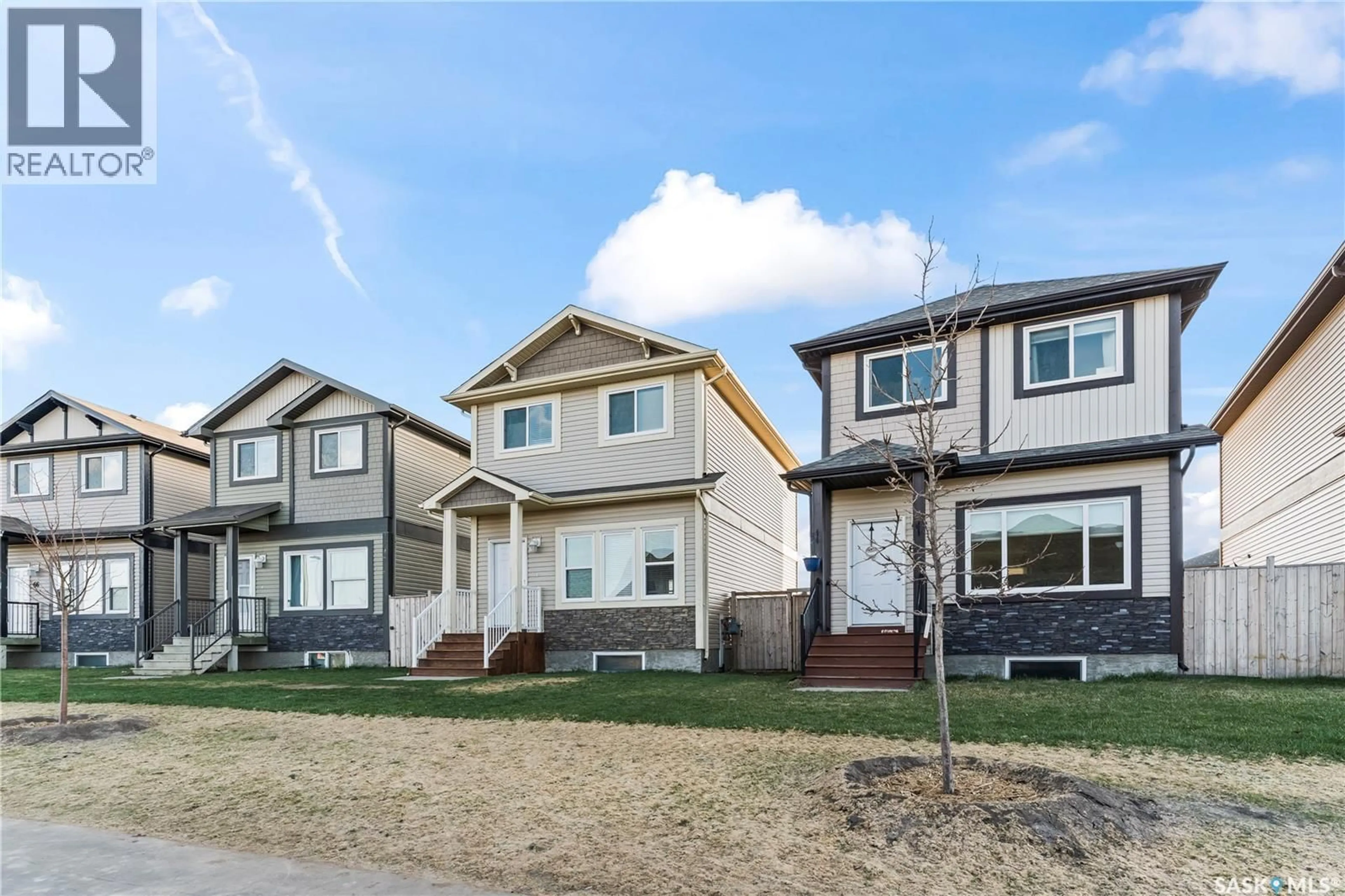 Home with vinyl exterior material, street for 68 235 ROSEWOOD BOULEVARD E, Saskatoon Saskatchewan S7V0J2