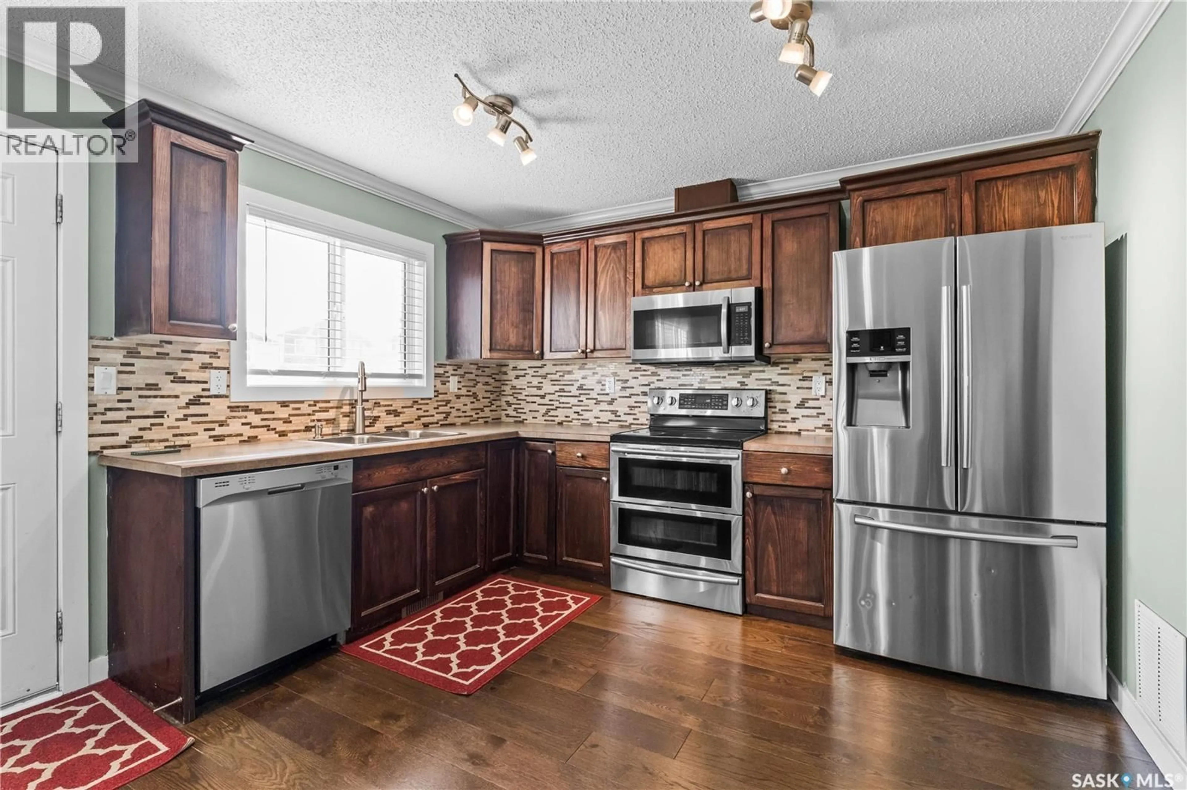 Open concept kitchen, unknown for 68 235 ROSEWOOD BOULEVARD E, Saskatoon Saskatchewan S7V0J2