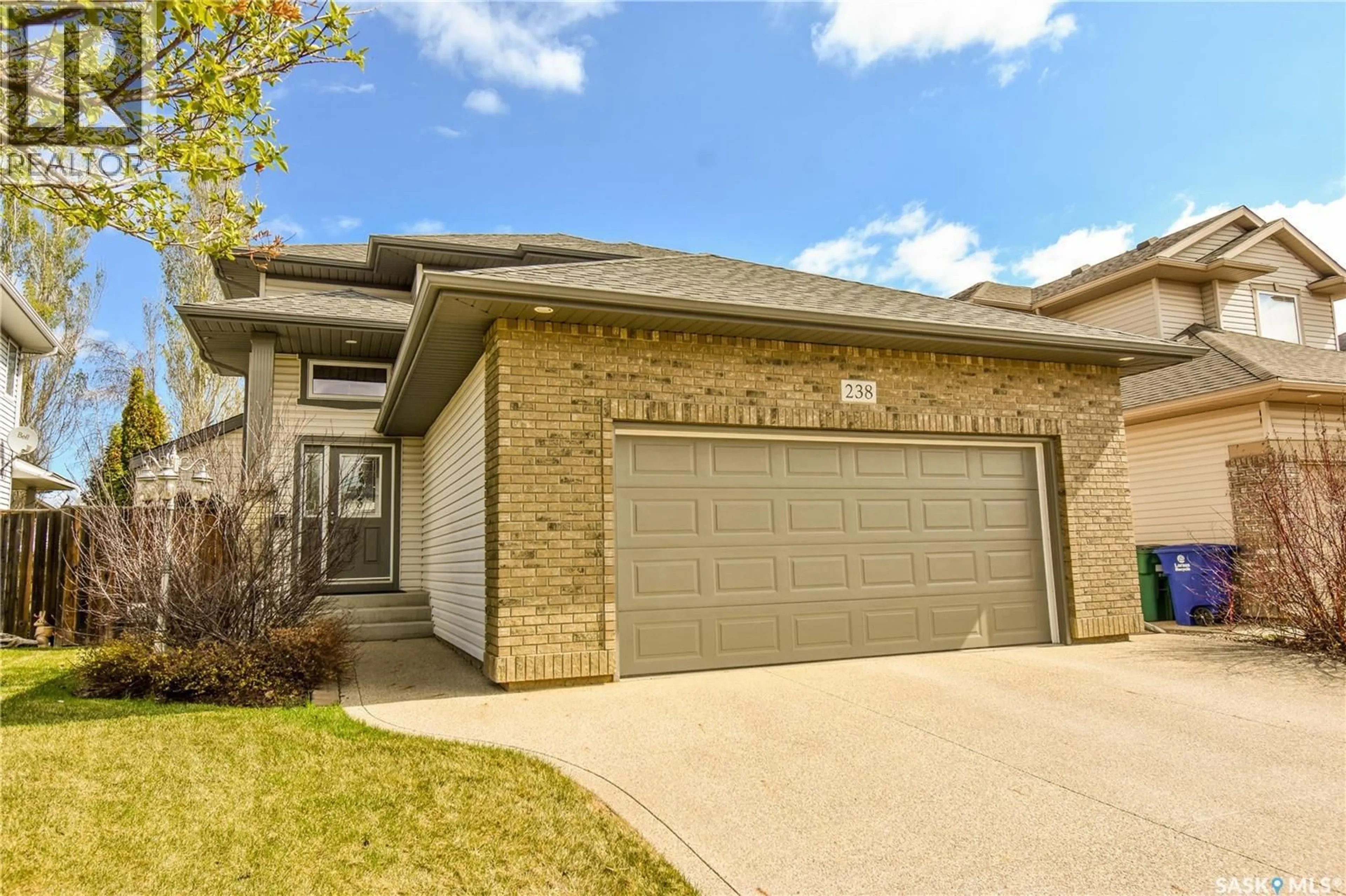 Home with brick exterior material, street for 238 STEPNEY CRESCENT, Saskatoon Saskatchewan S7T0A1