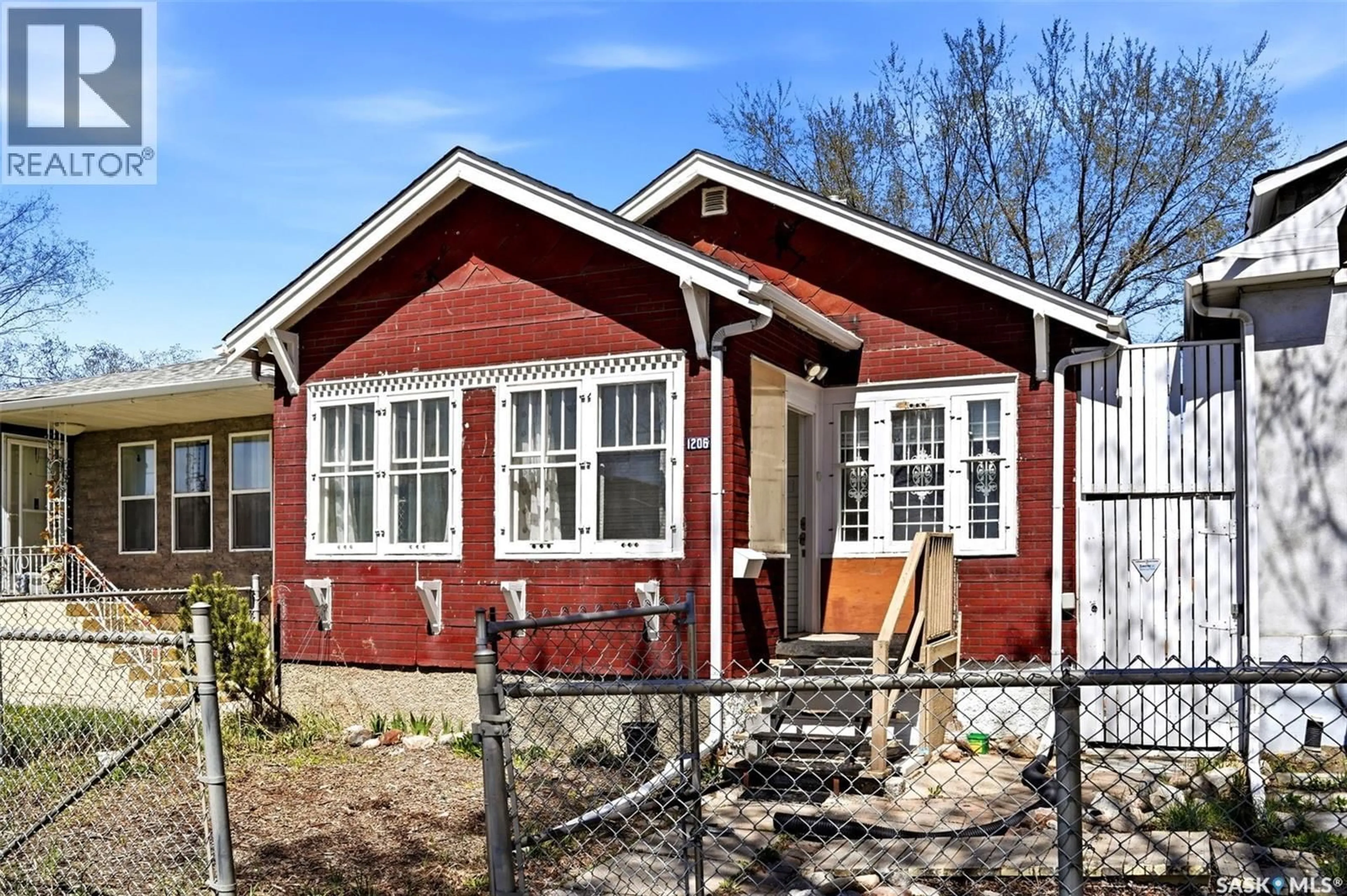 Home with brick exterior material, building for 1206 VICTORIA AVENUE, Regina Saskatchewan S4P0N9