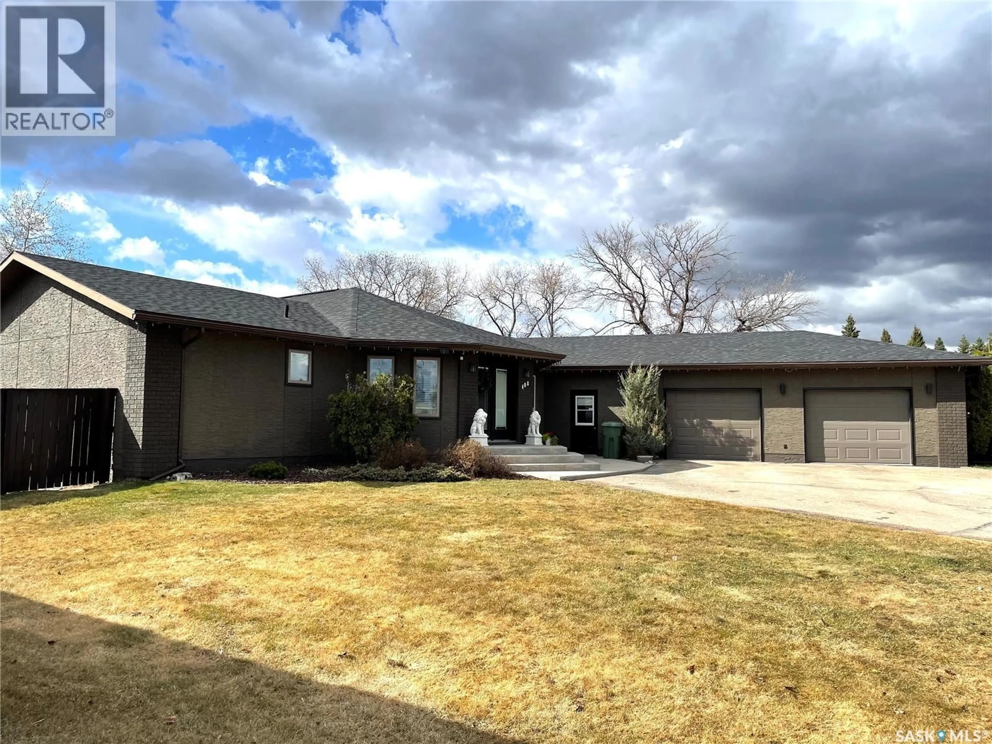 Home with brick exterior material, street for 408 MACDONALD STREET, Nipawin Saskatchewan S0E1E0