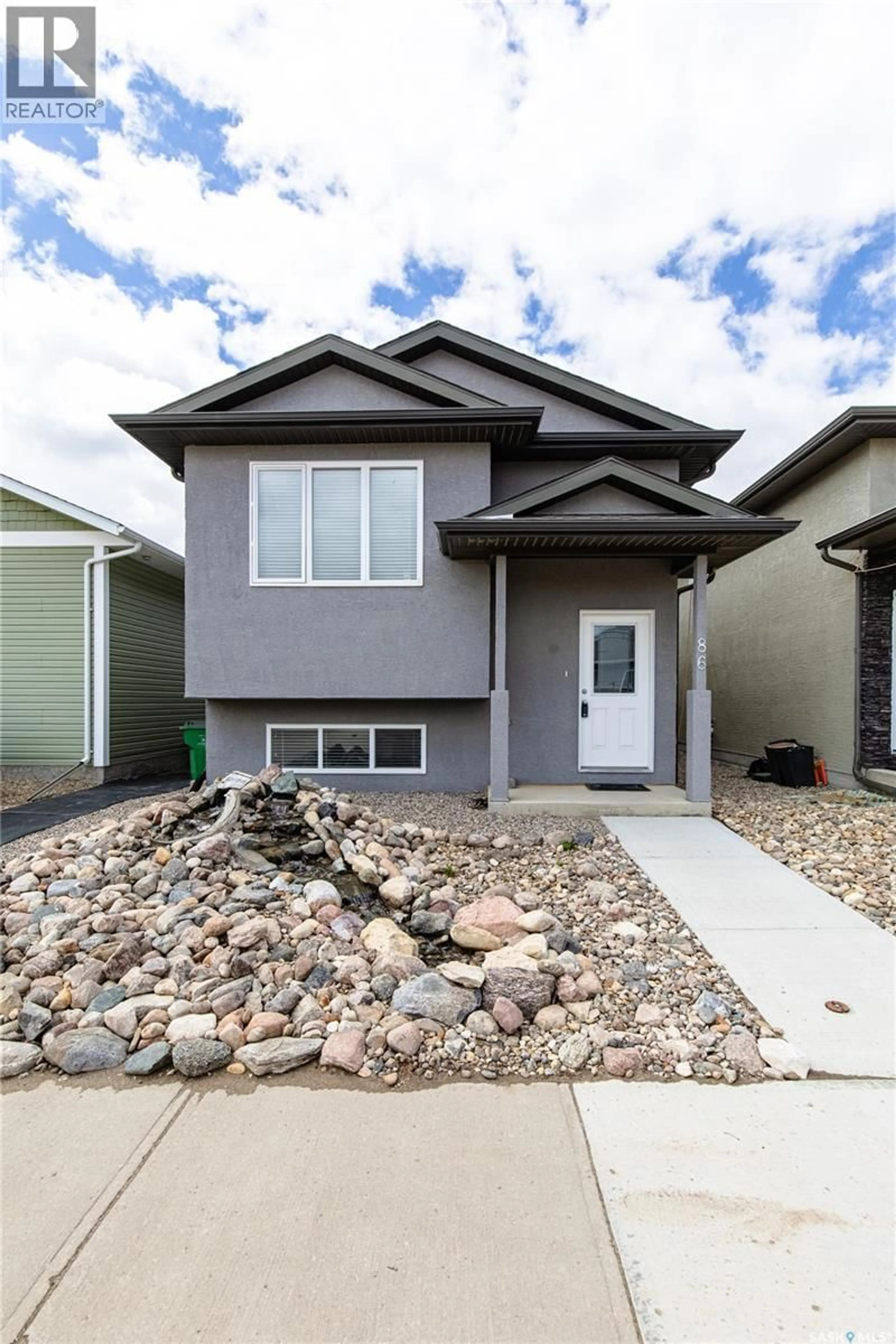 Home with vinyl exterior material, street for 86 BRIGHAM ROAD, Moose Jaw Saskatchewan S6K0A7