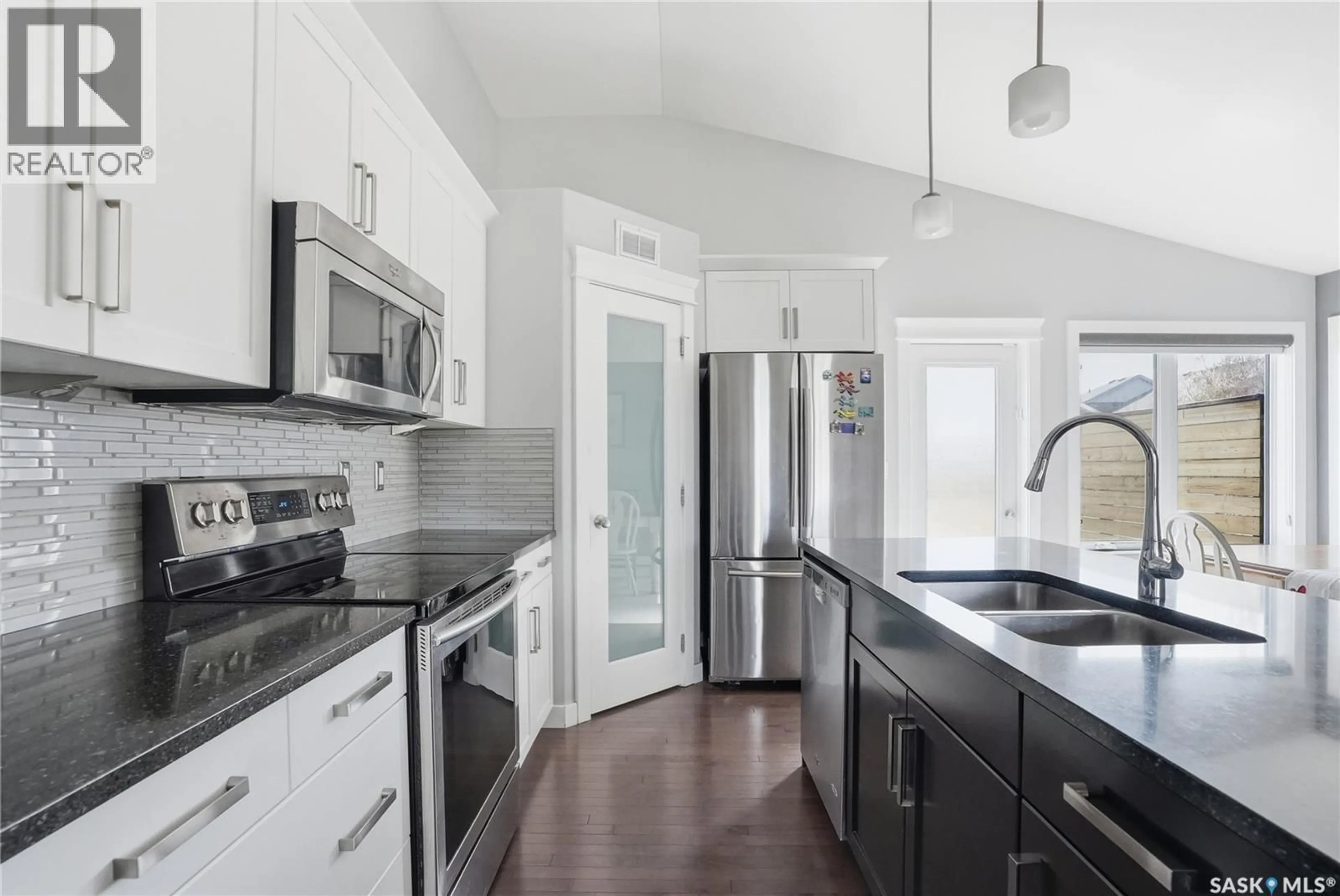 Open concept kitchen, ceramic/tile floor for 1111 EVERGREEN BOULEVARD, Saskatoon Saskatchewan S7W0R5