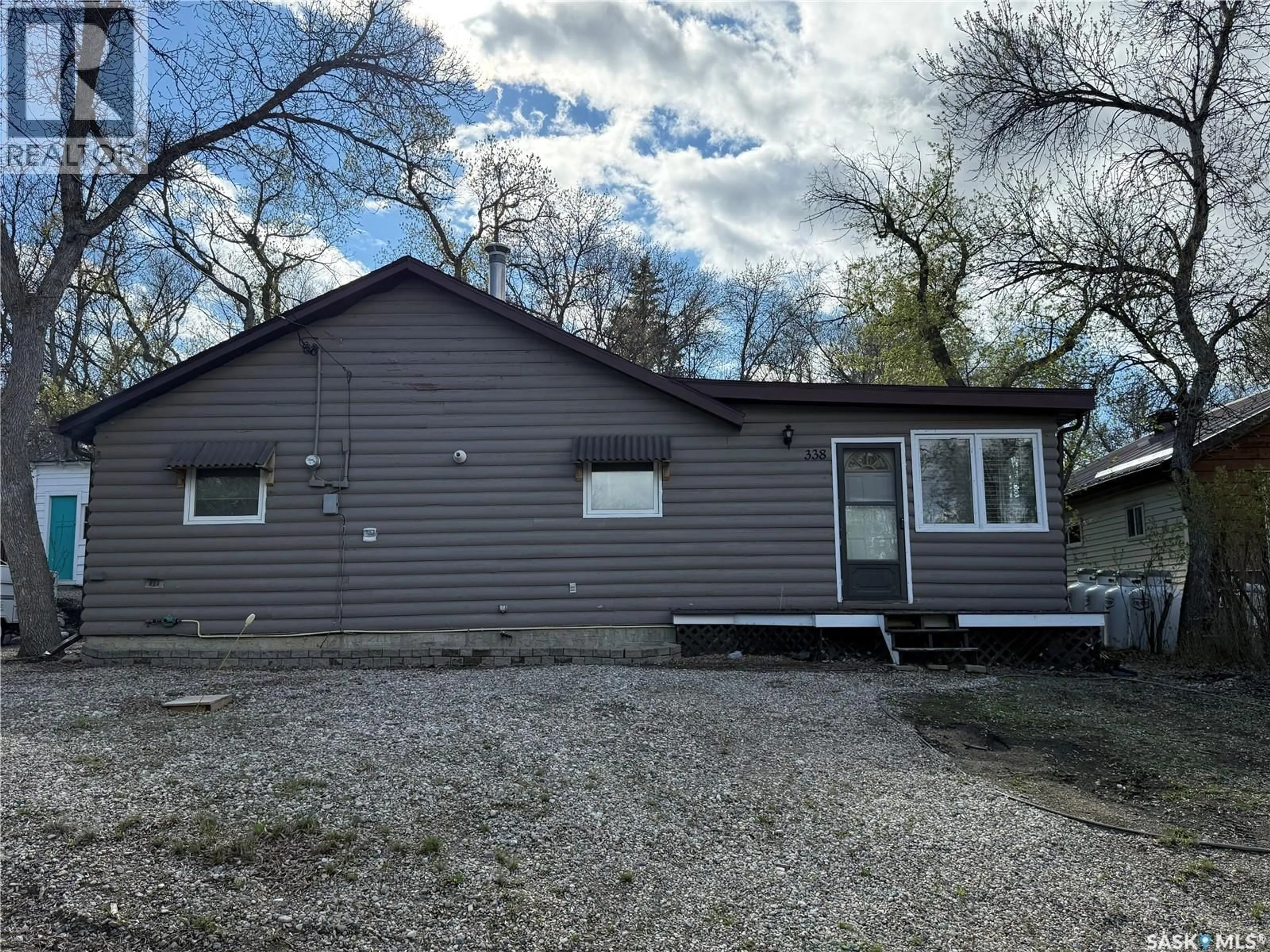 Home with vinyl exterior material, unknown for 338 3RD STREET, Regina Beach Saskatchewan S0G4C0
