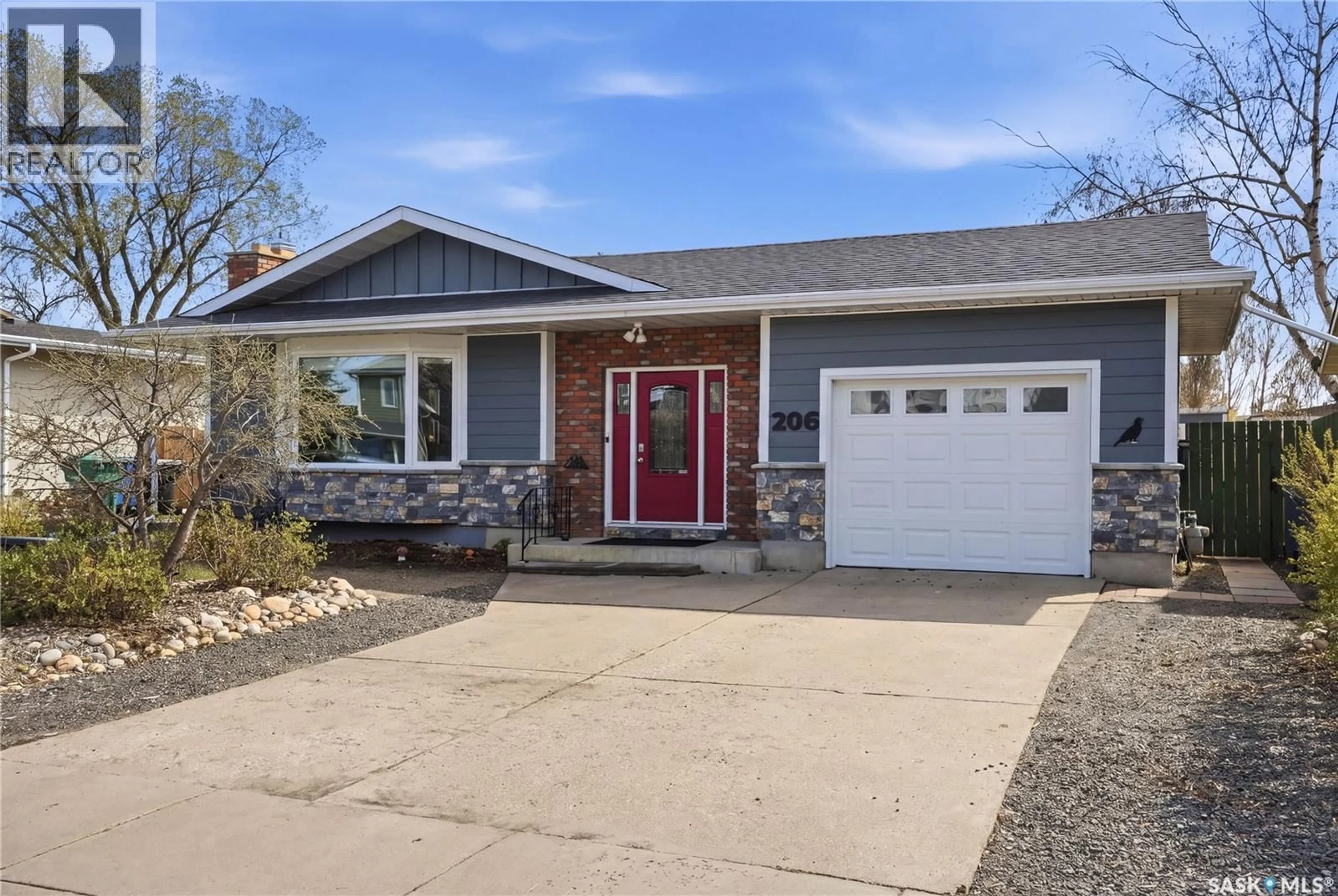 Home with vinyl exterior material, street for 206 LA LOCHE TERRACE, Saskatoon Saskatchewan S7K4R9