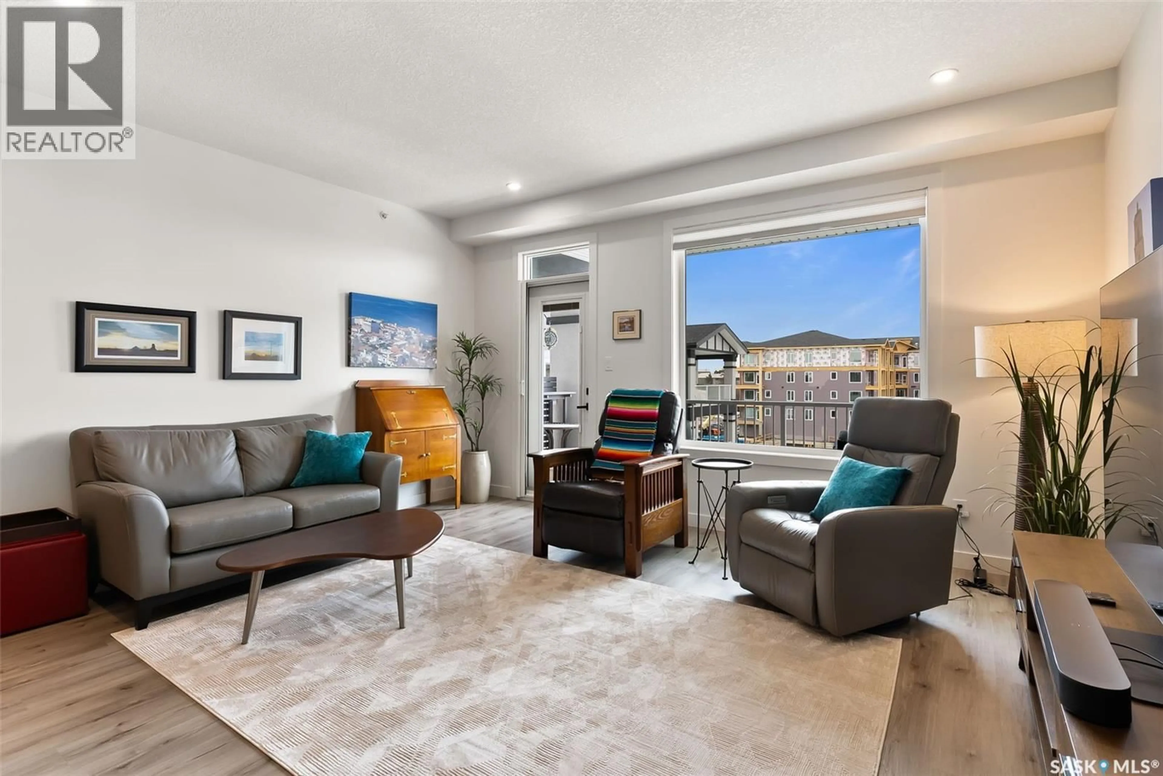 Living room with furniture, unknown for 417 3581 EVANS COURT, Regina Saskatchewan S4S7A3