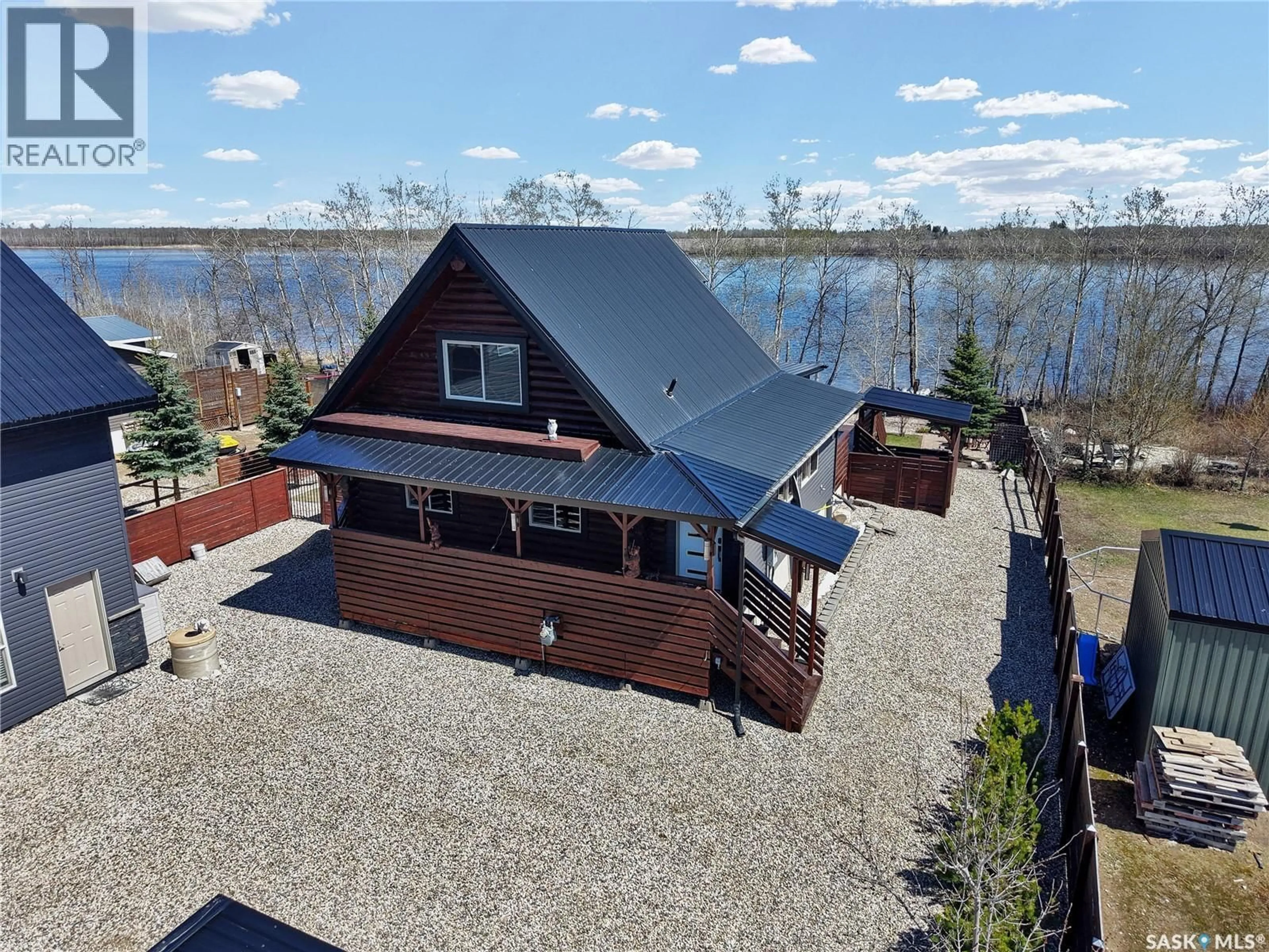 A pic from outside/outdoor area/front of a property/back of a property/a pic from drone, water/lake/river/ocean view for 43 LAKESHORE DRIVE, Three Lakes Rm No. 400 Saskatchewan S0K2X0