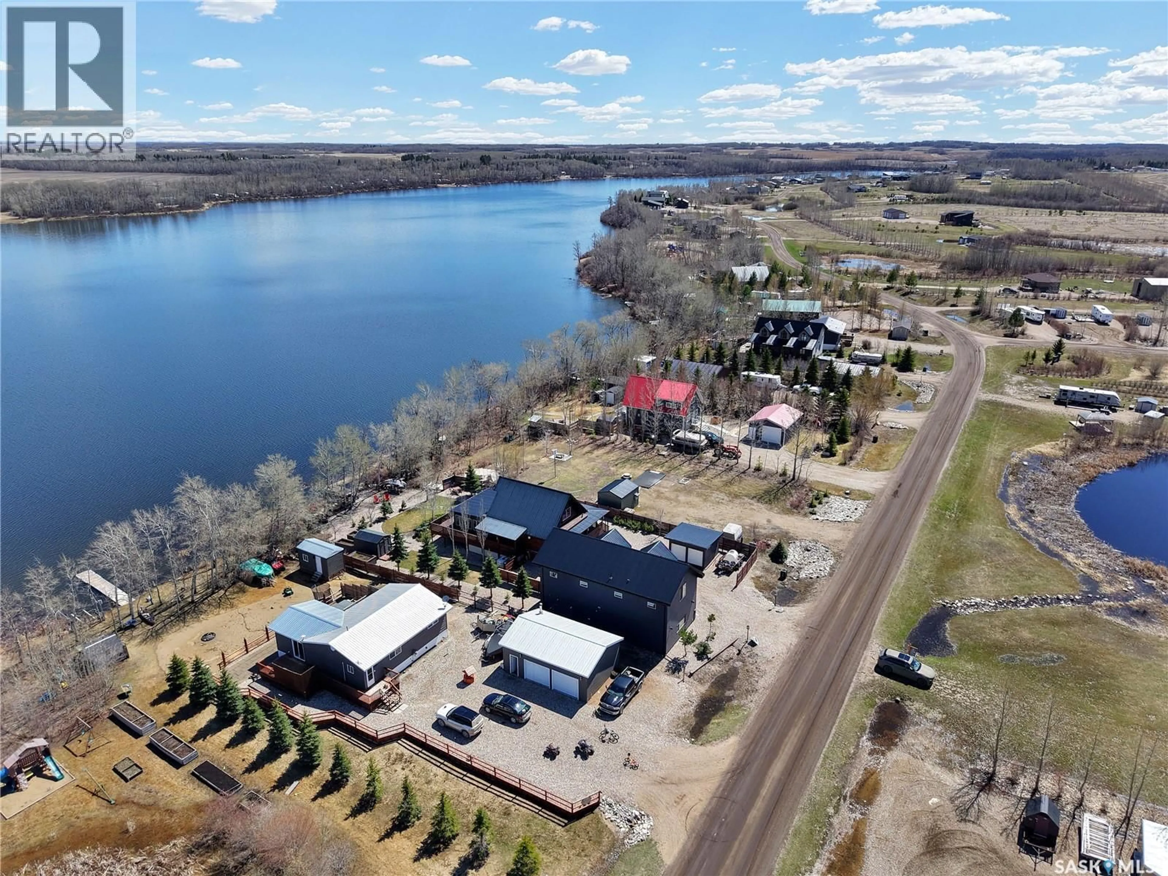 A pic from outside/outdoor area/front of a property/back of a property/a pic from drone, water/lake/river/ocean view for 43 LAKESHORE DRIVE, Three Lakes Rm No. 400 Saskatchewan S0K2X0