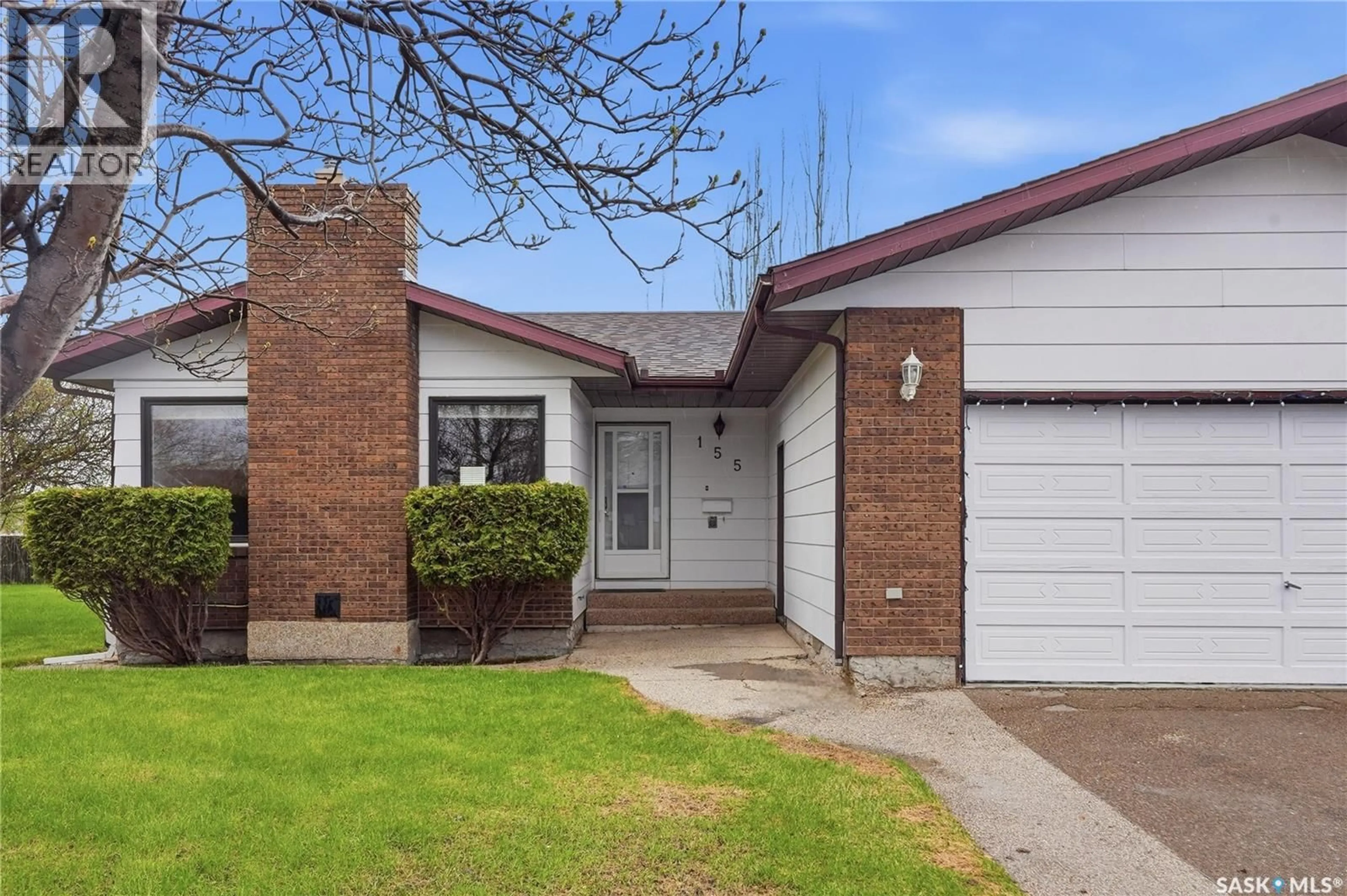 Home with brick exterior material, street for 155 J.J. THIESSEN CRESCENT, Saskatoon Saskatchewan S7K5N9