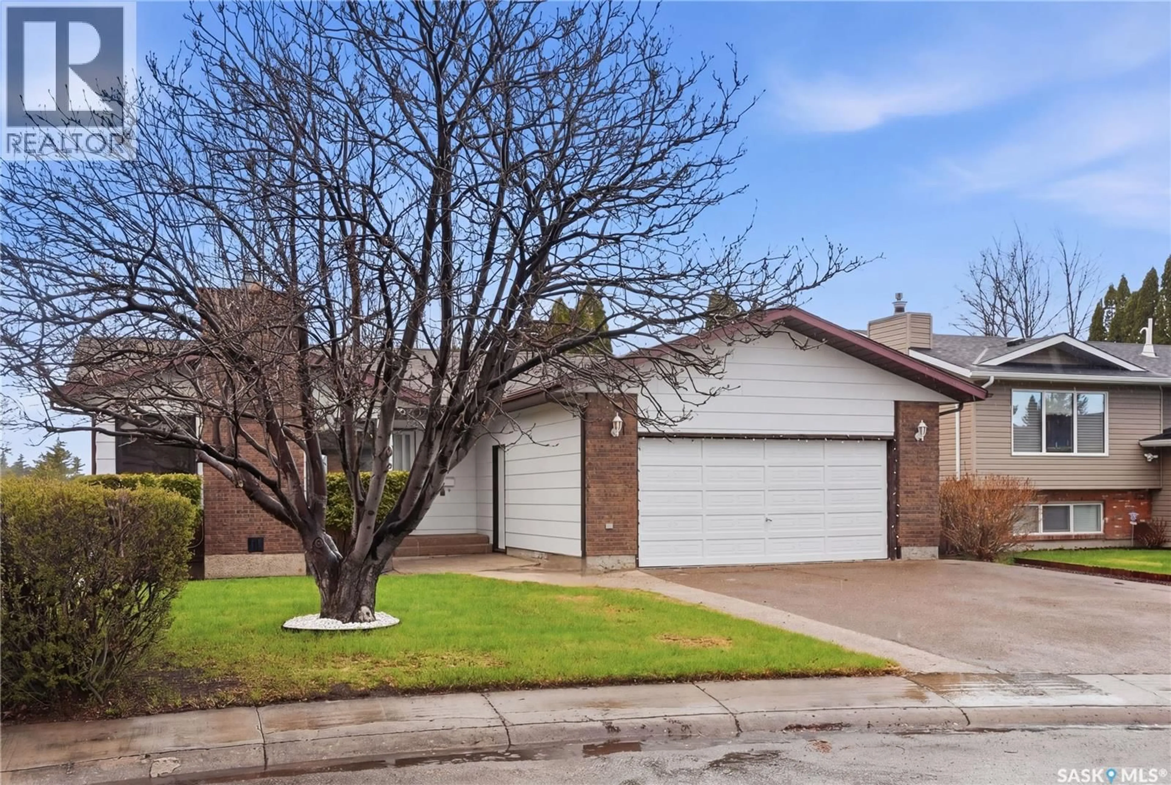 Home with brick exterior material, street for 155 J.J. THIESSEN CRESCENT, Saskatoon Saskatchewan S7K5N9