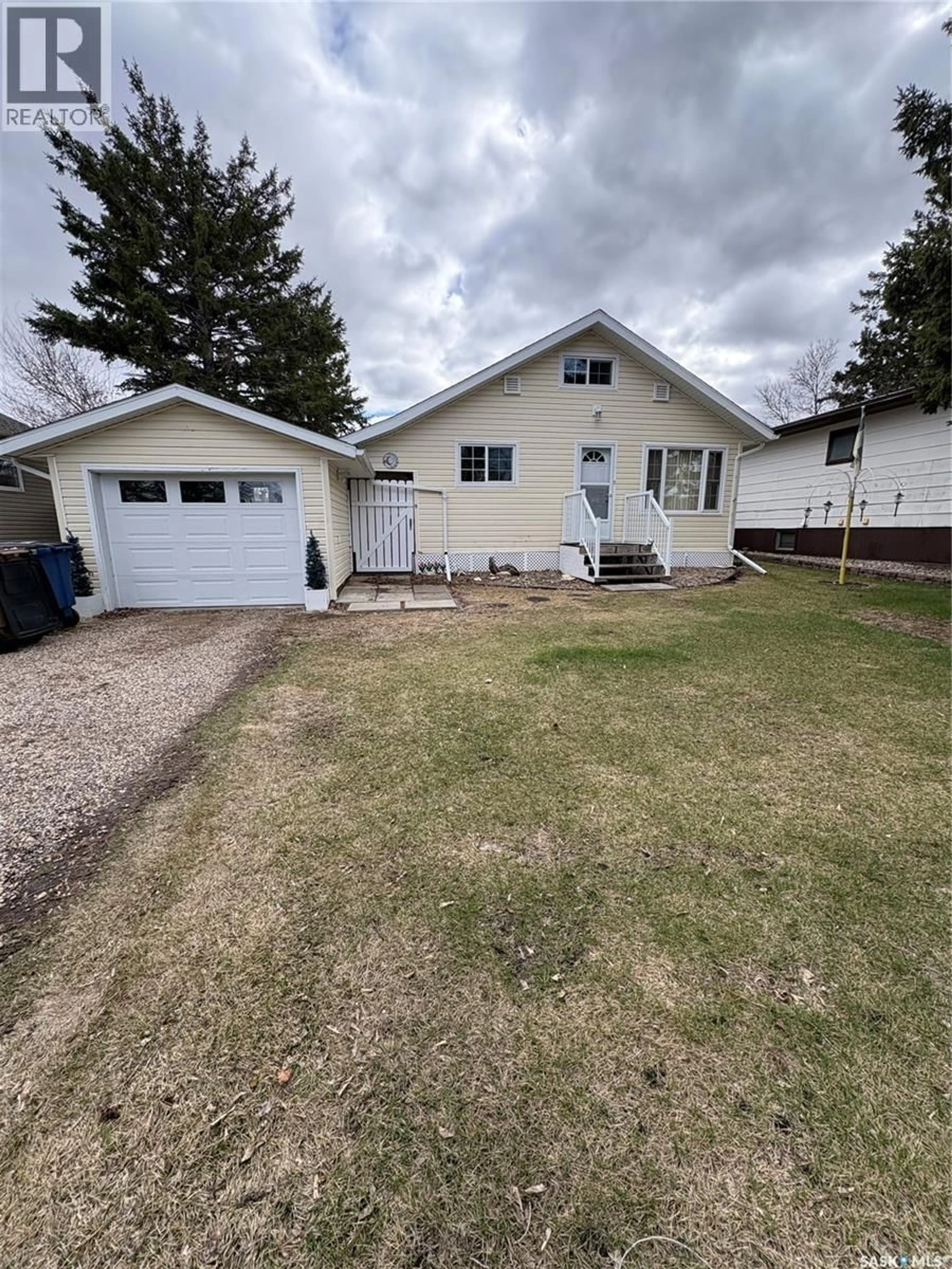A pic from outside/outdoor area/front of a property/back of a property/a pic from drone, street for 209 2ND AVENUE, Kelvington Saskatchewan S0A1W0
