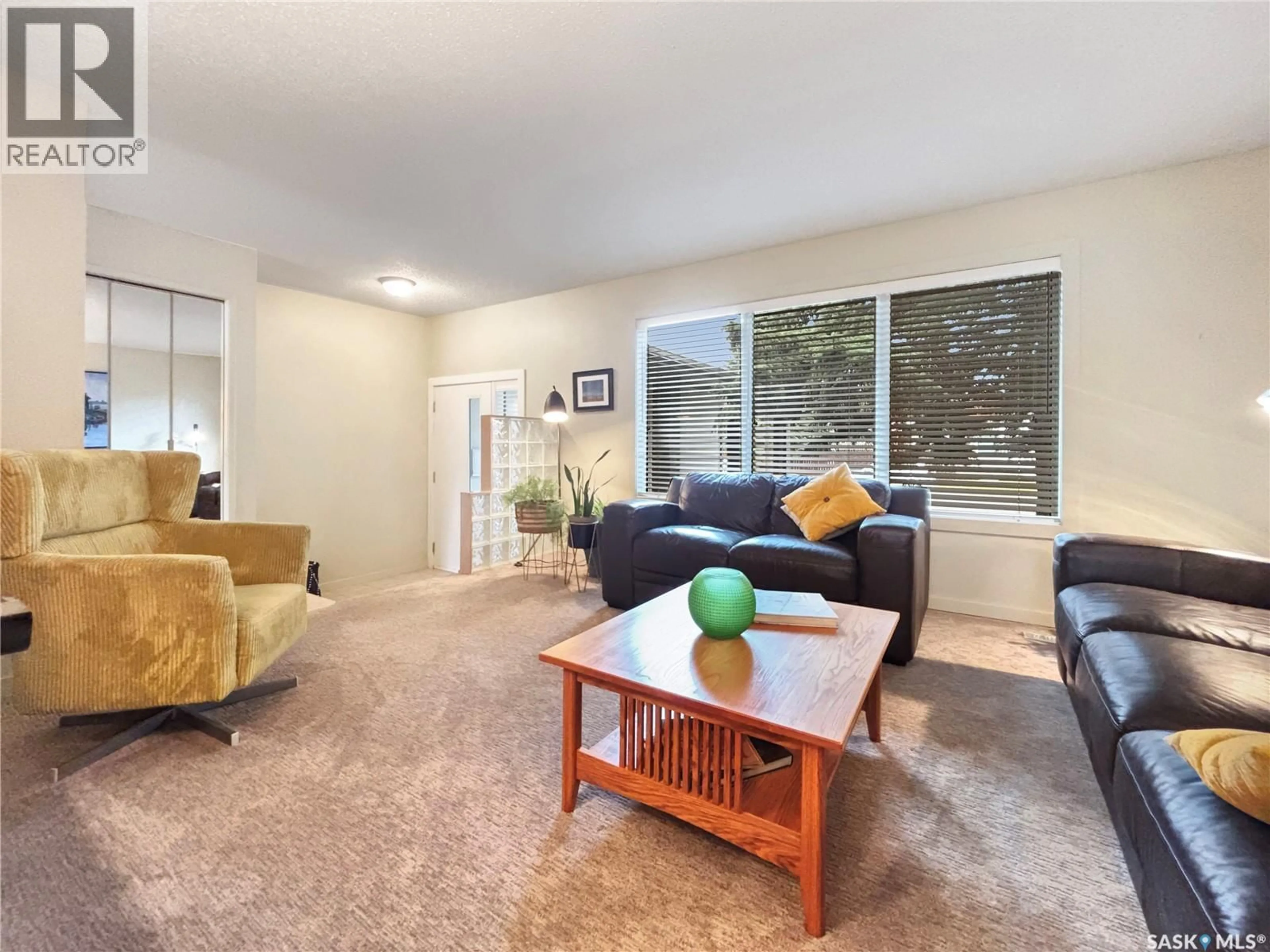 Living room with furniture, carpet floor for 355 BALL CRESCENT, Saskatoon Saskatchewan S7K6E3