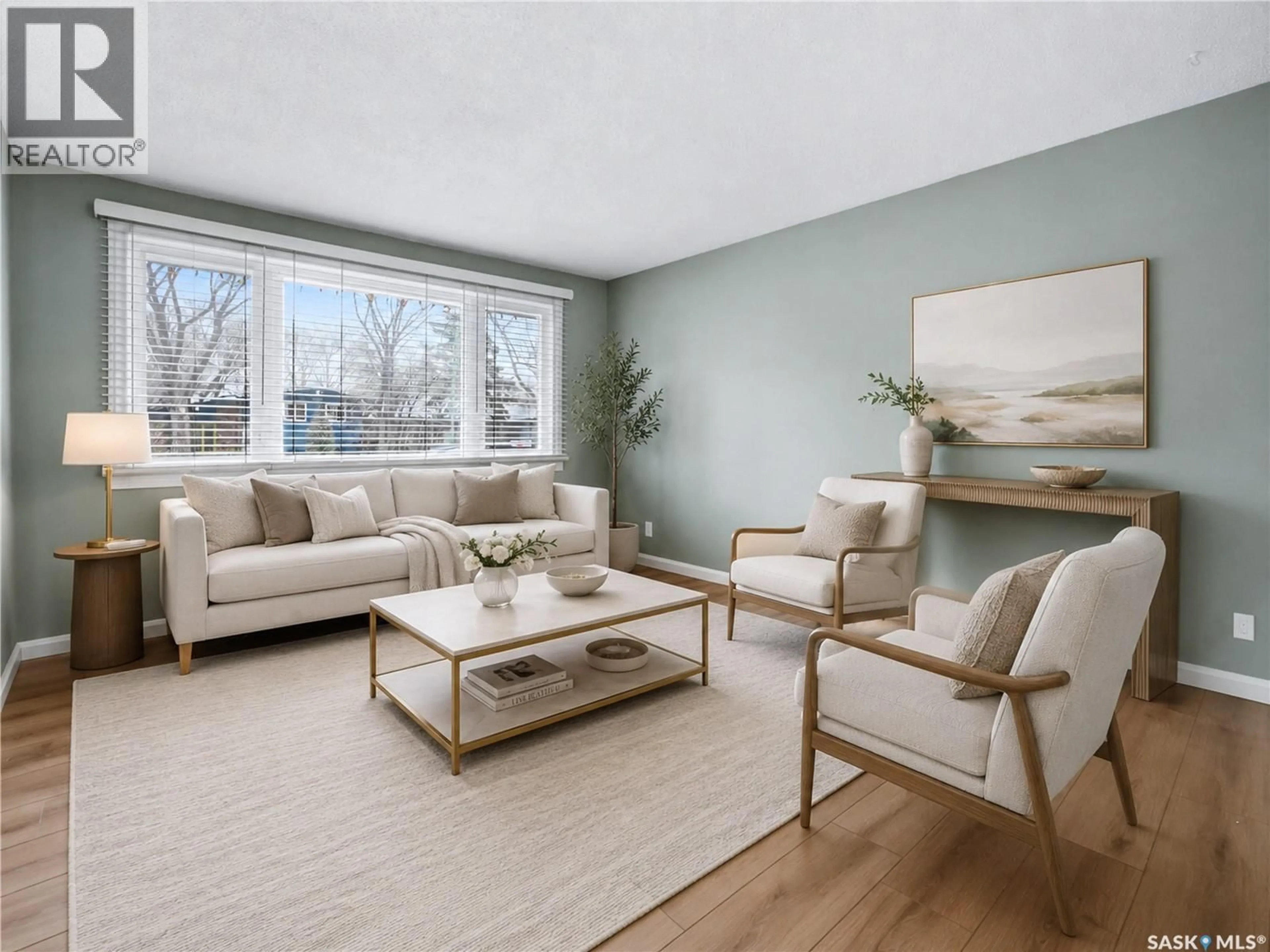 Living room with furniture, wood/laminate floor for 219 NAGEL CRESCENT, Regina Saskatchewan S4N4N4
