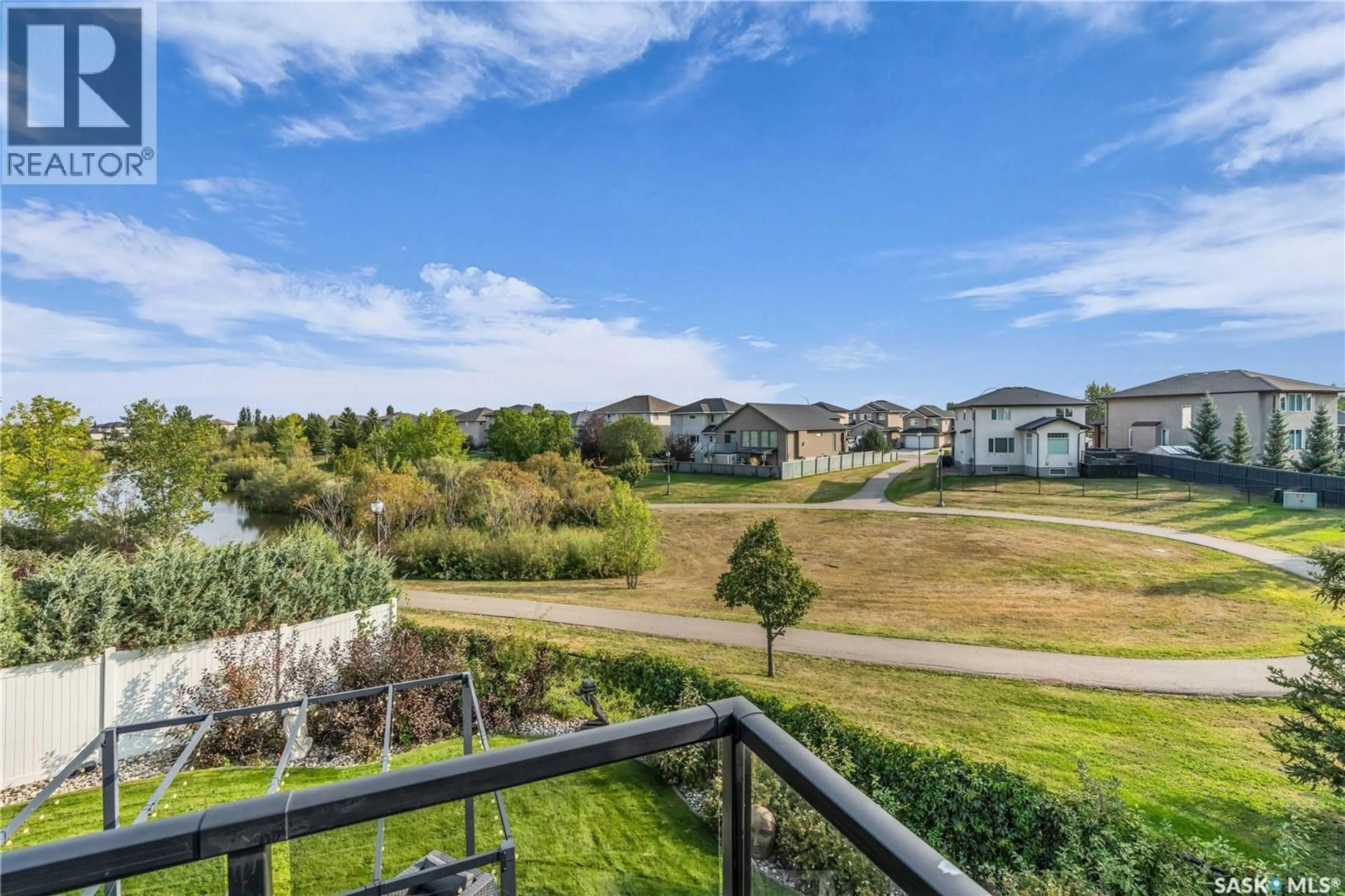A pic from outside/outdoor area/front of a property/back of a property/a pic from drone, water/lake/river/ocean view for 2431 LINNER BAY, Regina Saskatchewan S4V1K3