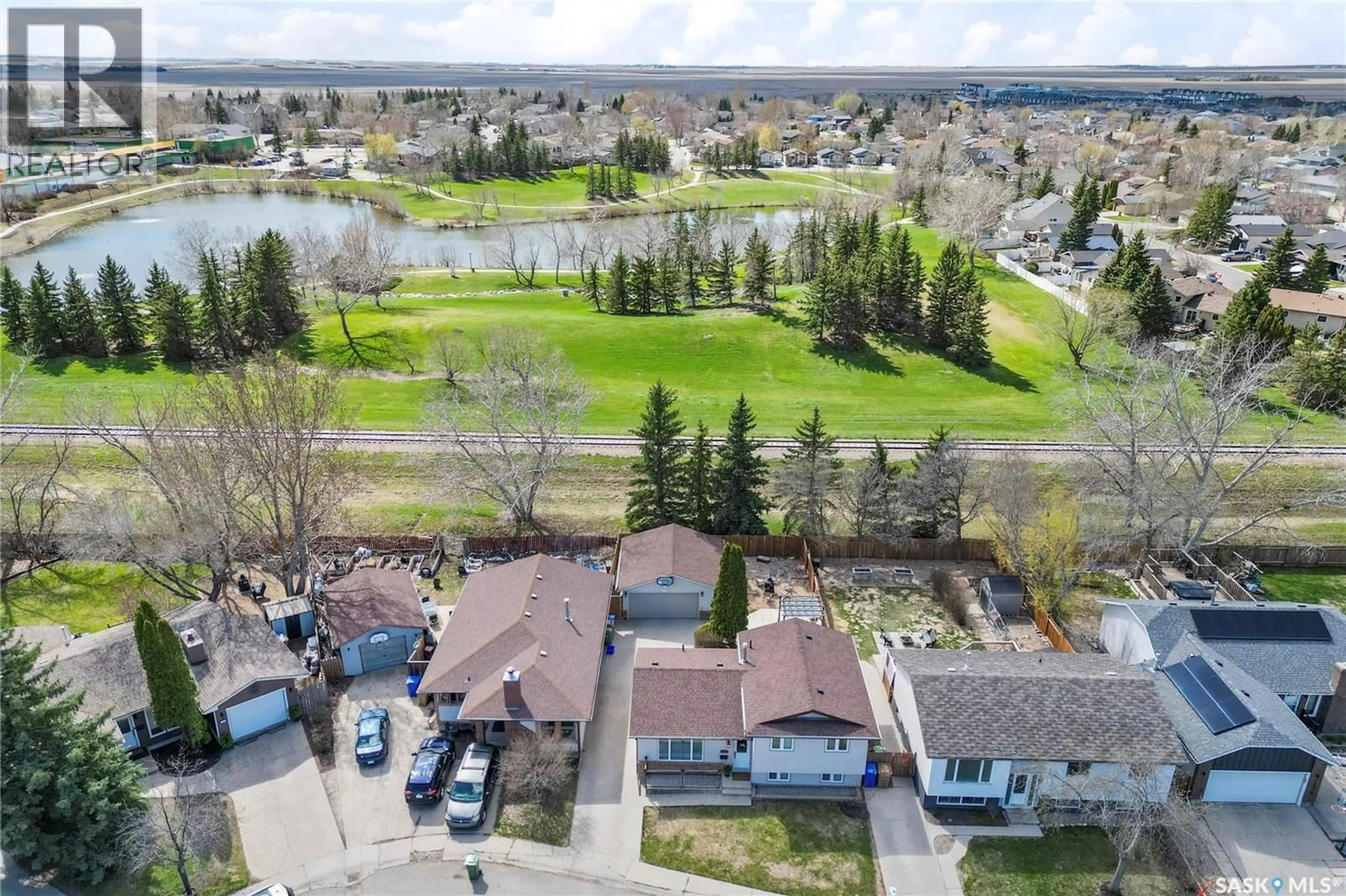 A pic from outside/outdoor area/front of a property/back of a property/a pic from drone, water/lake/river/ocean view for 1206 FLEXMAN CRESCENT, Regina Saskatchewan S4X2Y8