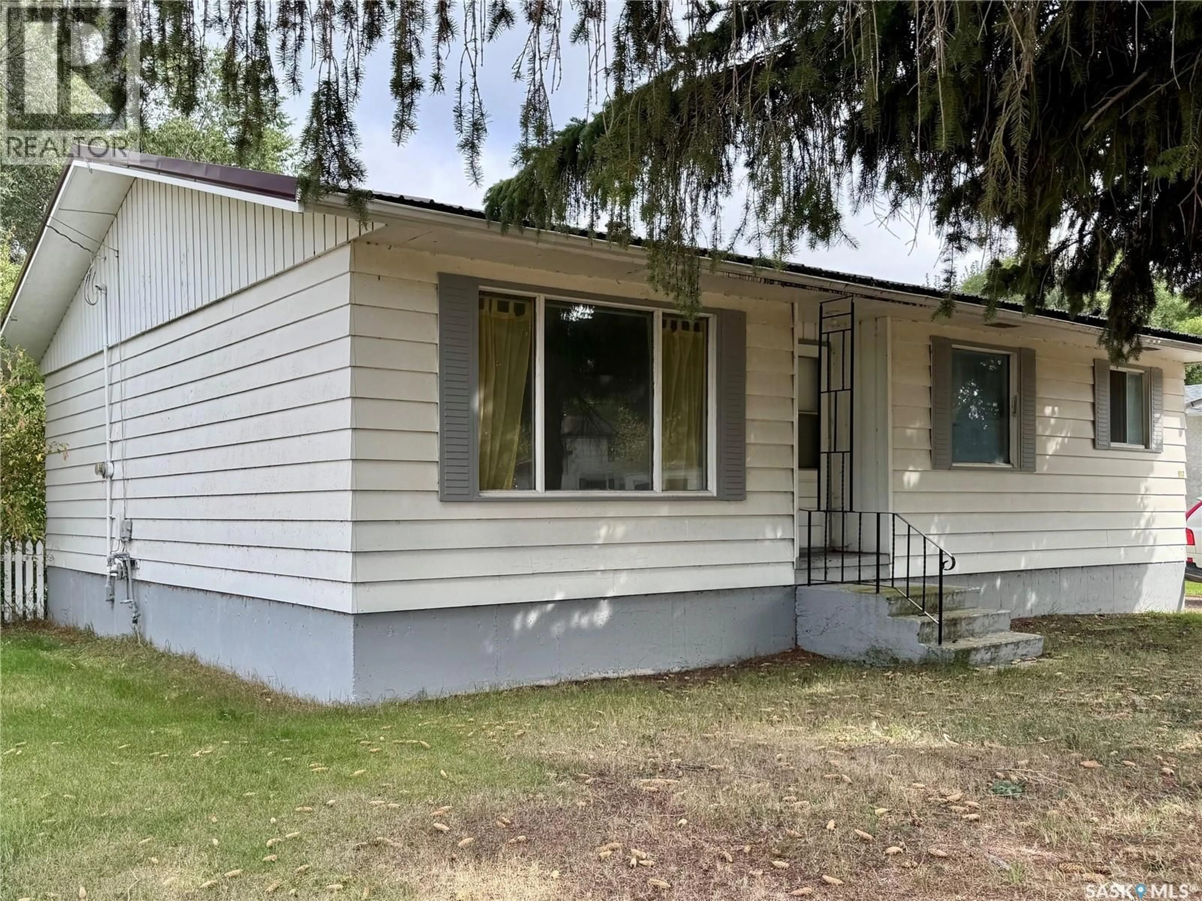 Home with vinyl exterior material, street for 917 GALT STREET, Whitewood Saskatchewan S0G5C0