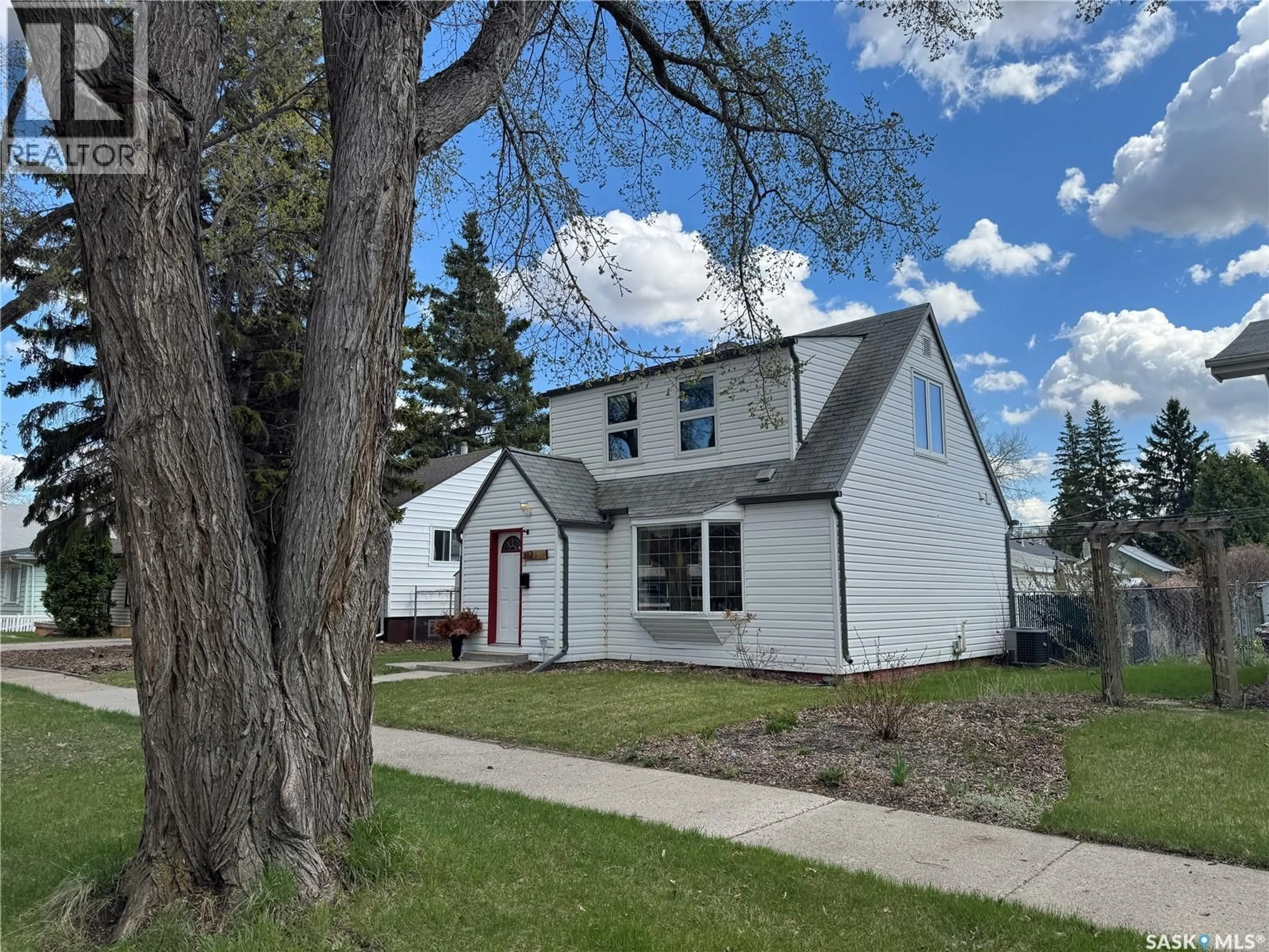 Home with vinyl exterior material, street for 312 1ST STREET, Saskatoon Saskatchewan S7H1S2