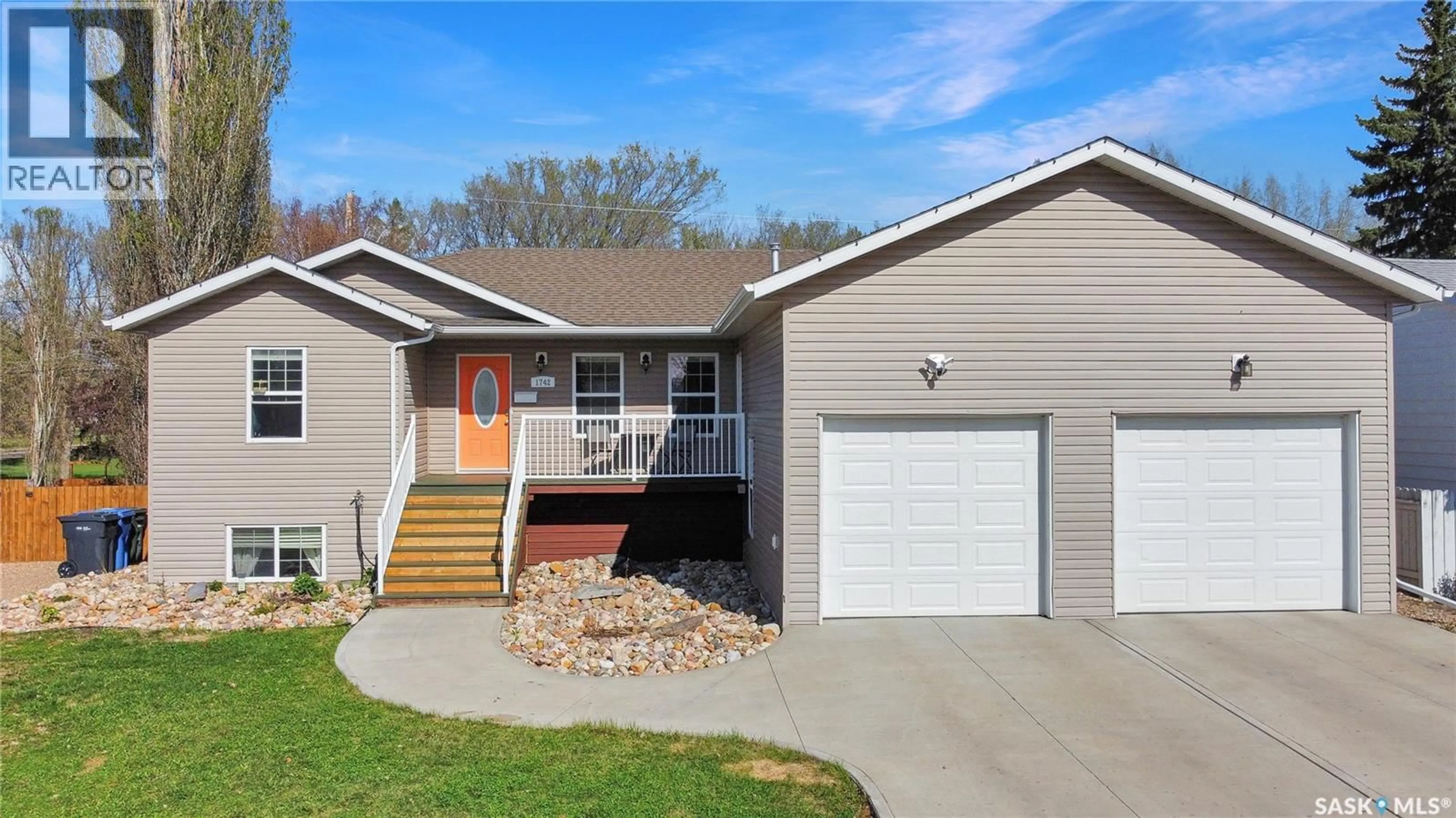 Home with vinyl exterior material, street for 1742 93RD STREET, North Battleford Saskatchewan S9A0C8