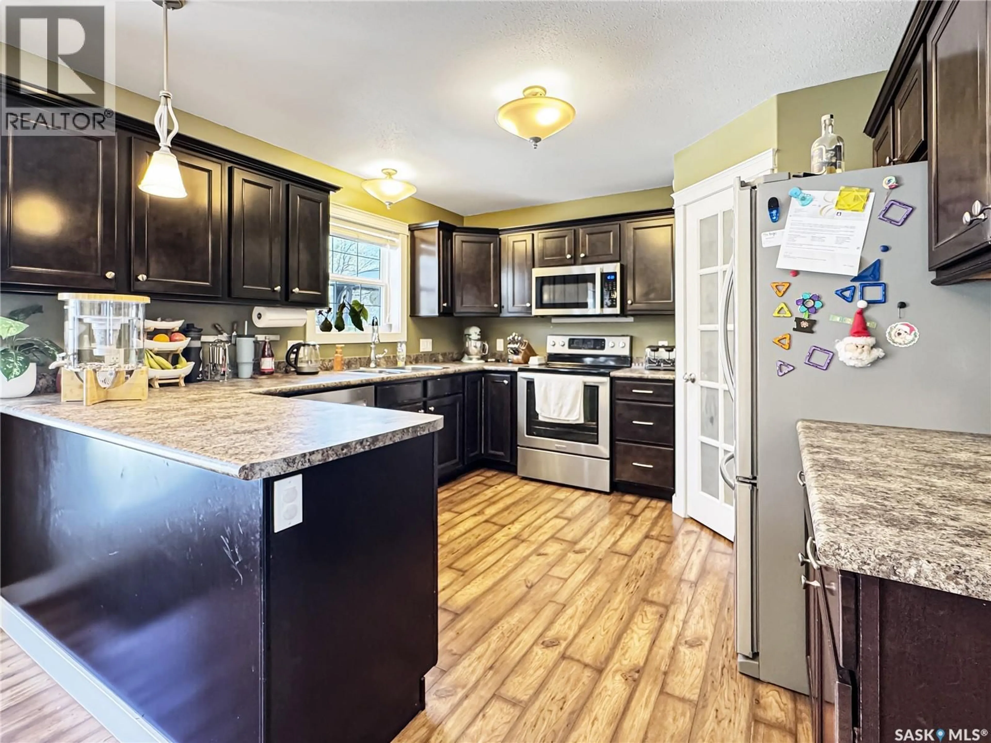 Open concept kitchen, unknown for 1742 93RD STREET, North Battleford Saskatchewan S9A0C8