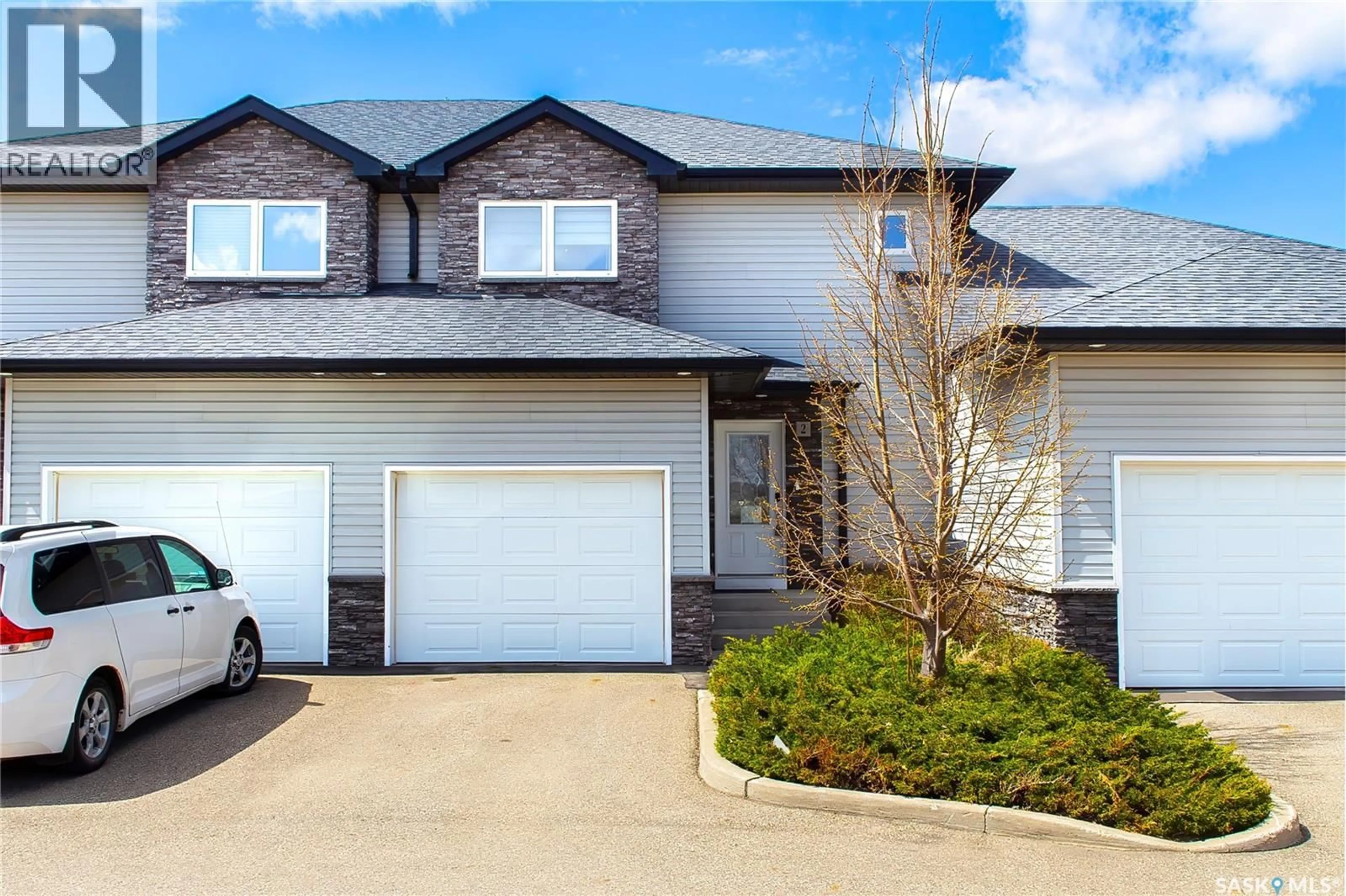Home with vinyl exterior material, street for 2 547 EAST HAMPTON BOULEVARD, Saskatoon Saskatchewan S7R0B1