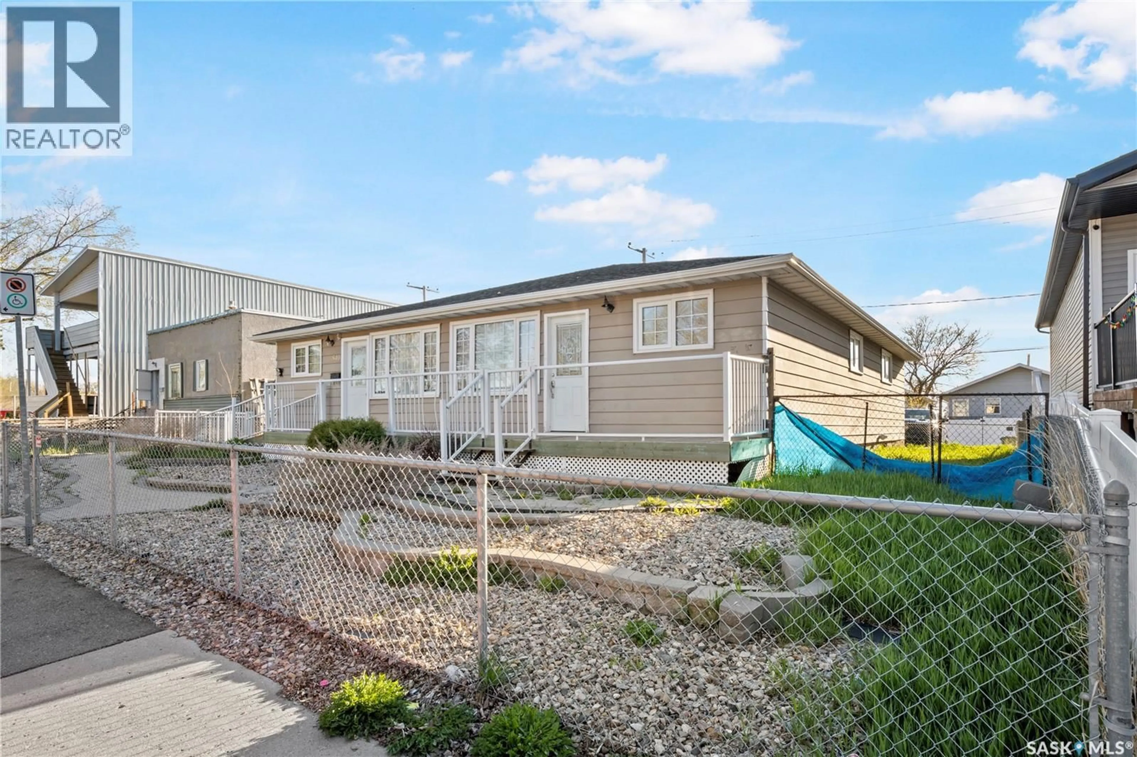 Home with vinyl exterior material, street for 540 WASCANA STREET, Regina Saskatchewan S4R4J2