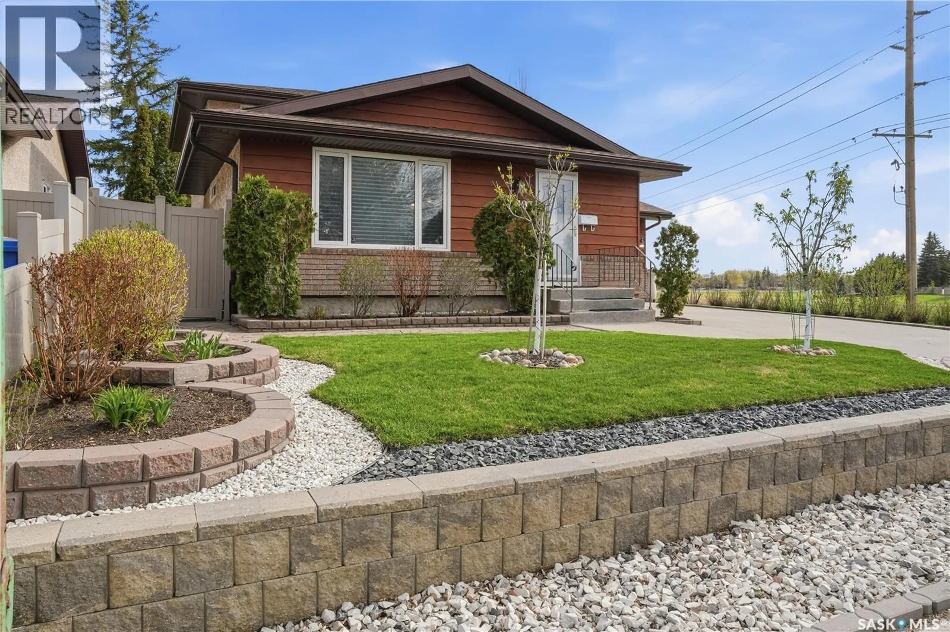 Home with brick exterior material, street for 2403 TRUESDALE DRIVE, Regina Saskatchewan S4V0W1