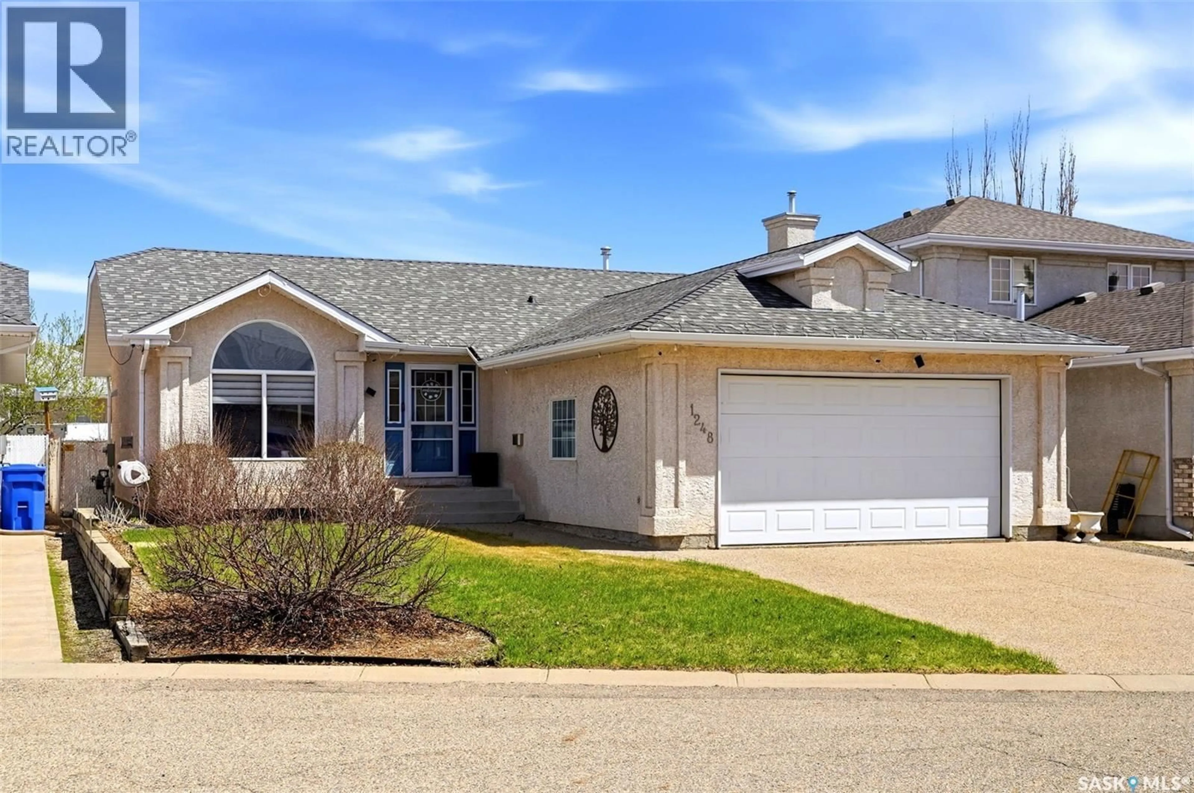 Home with vinyl exterior material, street for N - 1248 BOEHM BAY, Regina Saskatchewan S4X4M2