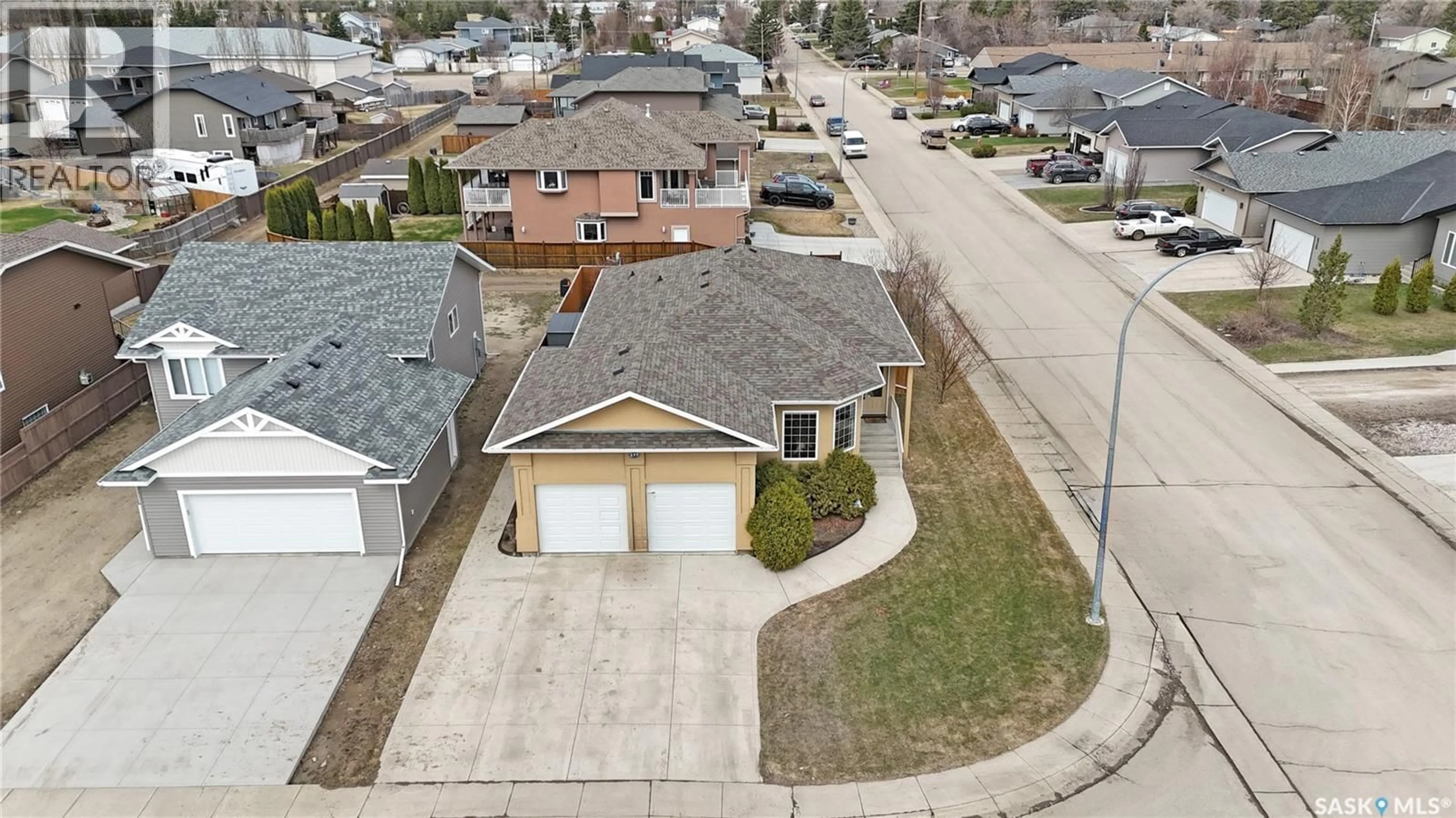 A pic from outside/outdoor area/front of a property/back of a property/a pic from drone, street for 177 FINCH CRESCENT, Langham Saskatchewan S0K2L0