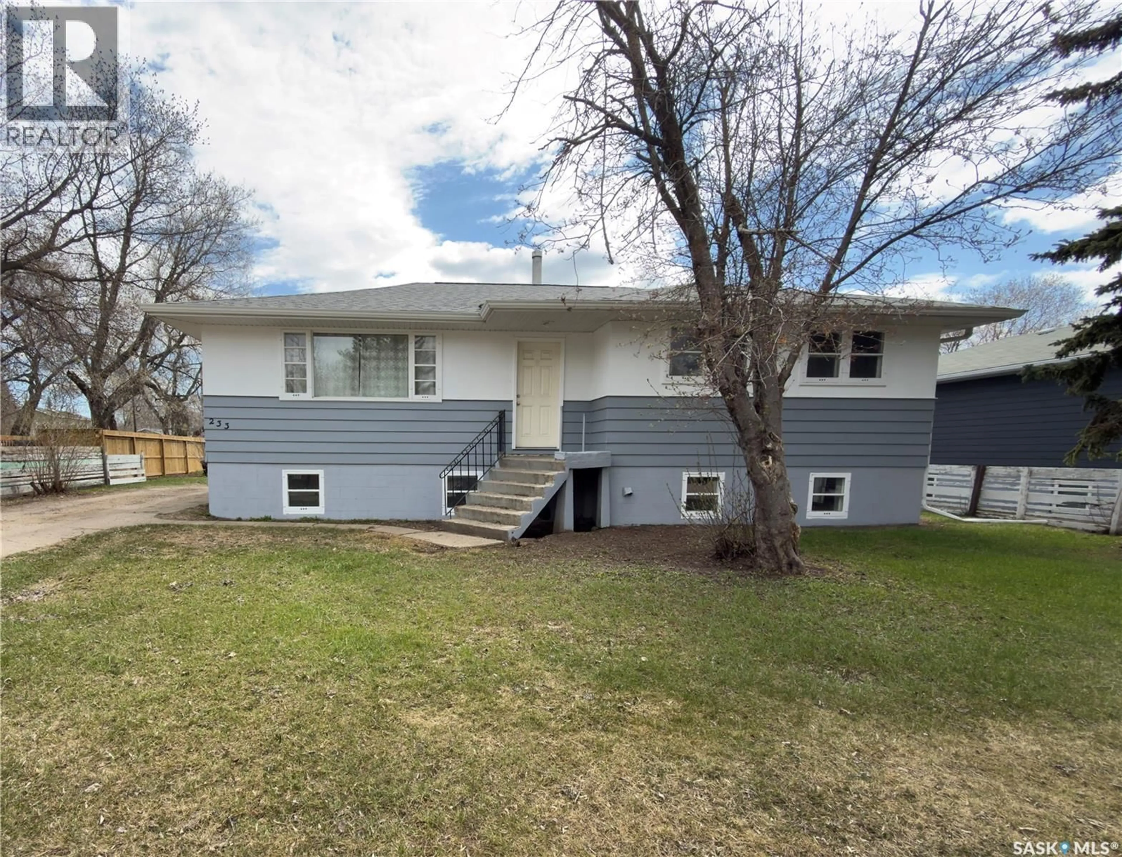 A pic from outside/outdoor area/front of a property/back of a property/a pic from drone, street for 233 23RD STREET, Prince Albert Saskatchewan S6V4L7