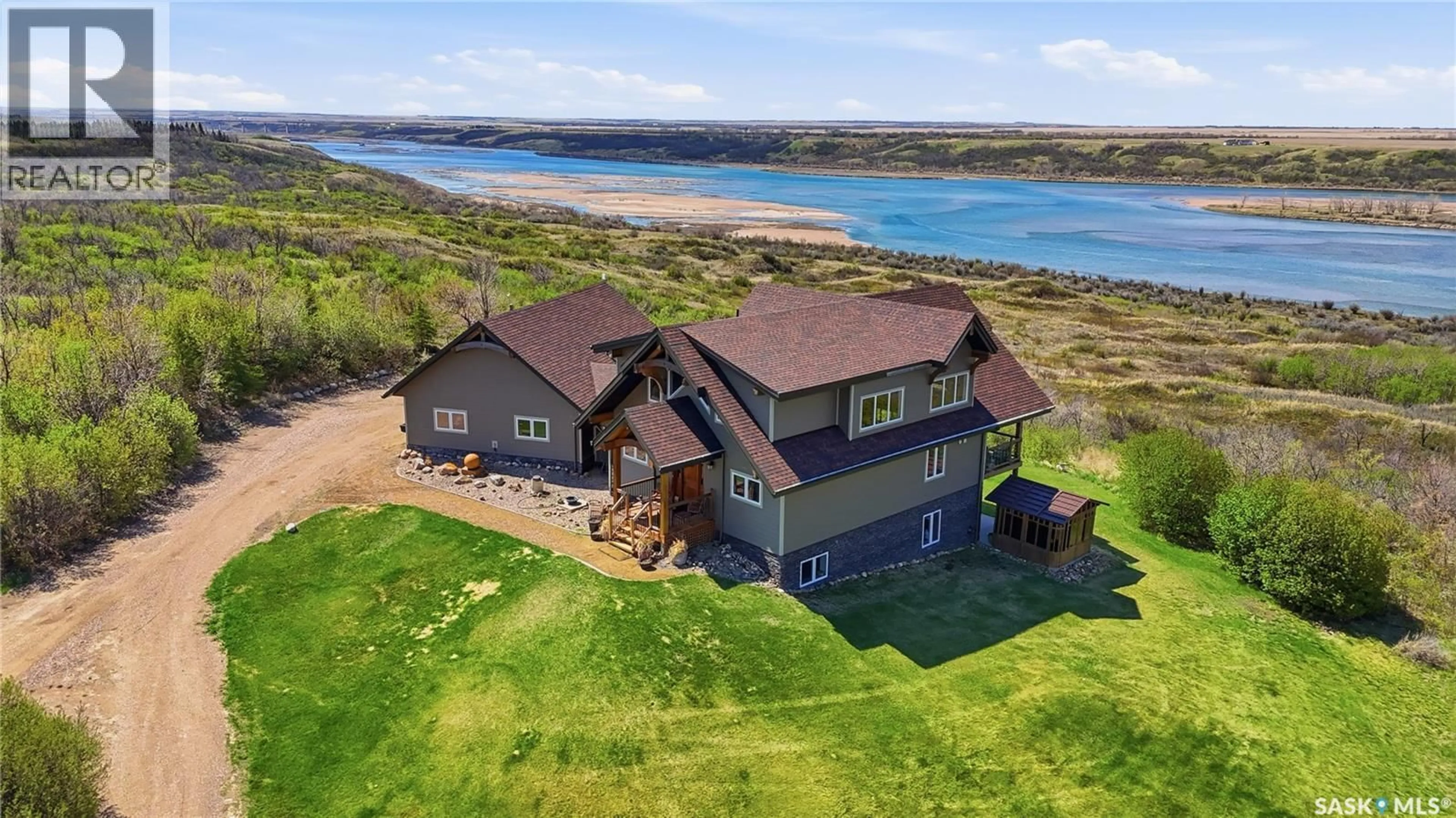 A pic from outside/outdoor area/front of a property/back of a property/a pic from drone, water/lake/river/ocean view for 166 RUDY LANE, Rudy Rm No. 284 Saskatchewan S0L2N0