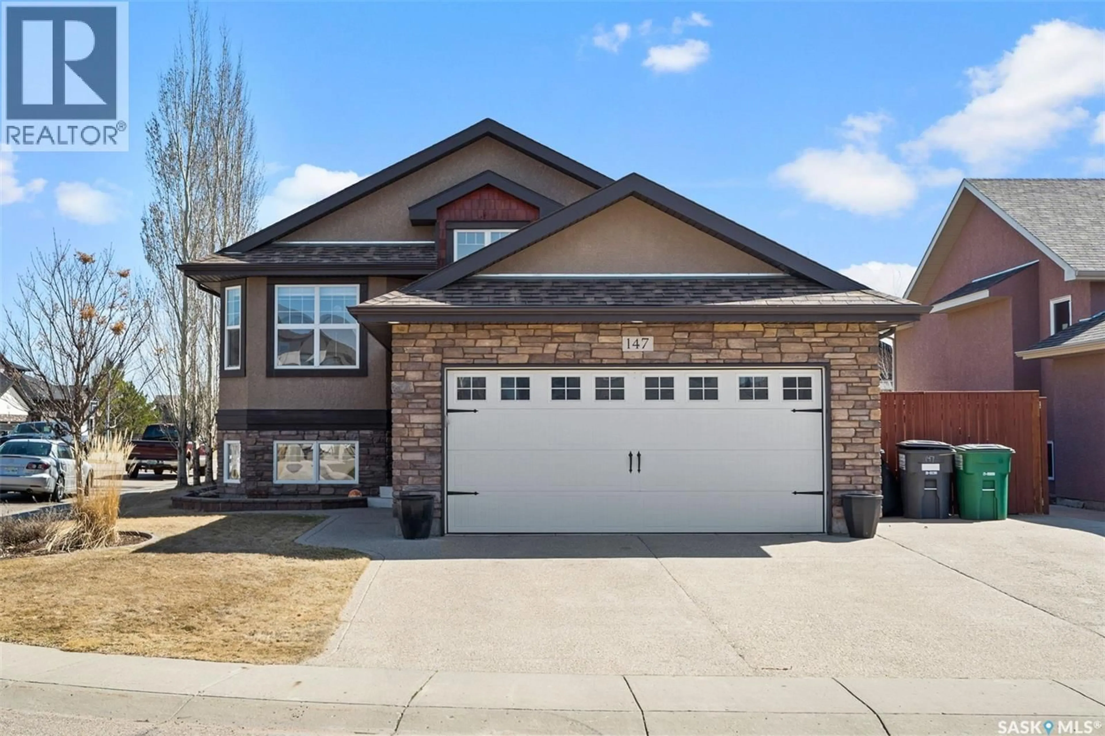 Home with brick exterior material, street for 147 BLACKSTOCK COVE, Saskatoon Saskatchewan S7T0H4